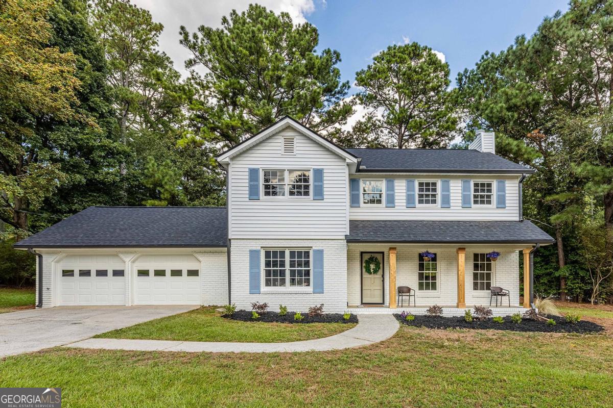 Beautiful renovation on a level lot in top East Cobb school with low taxes! This home feels like new with over $125k in renovations! Owner opened floorplan, expanded the master bath and powder room, added a completely new kitchen including cabinets, counters, appliances, baths, roof, water heater, A/C unit, lighting, flooring painting and much more! **Preferred lender will pay up to $6,000 towards closing costs or rate buydown!