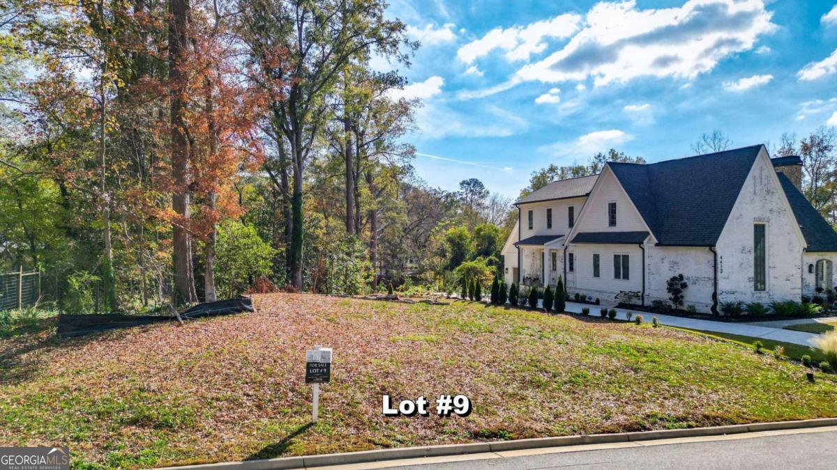 Don't miss this rare opportunity to build a custom luxury home in The Cove at Lake Acworth, a private gated 9-home community in the heart of downtown Acworth. This premier lot offers private lake access and is within walking distance of shops, parks, and restaurants. Work directly with the builder to design a home that suits your vision and lifestyle while enjoying the privacy and convenience of this unique lakeside community. Contact us today for more details on this exceptional home-site!