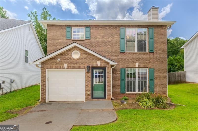 Enjoy easy living in this 3-bedroom, 2.5-bath home with no HOA restrictions. The open layout features a spacious living room with fireplace, luxury vinyl flooring, and a kitchen with stainless steel appliances, pantry, and breakfast bar. Upstairs, the owner's suite offers a tray ceiling and private bath, while two additional bedrooms share a full bath. Outside, relax on the patio or in the backyard. Convenient to I-20, I-675, and I-285, with flexibility for personal use or rental opportunities.