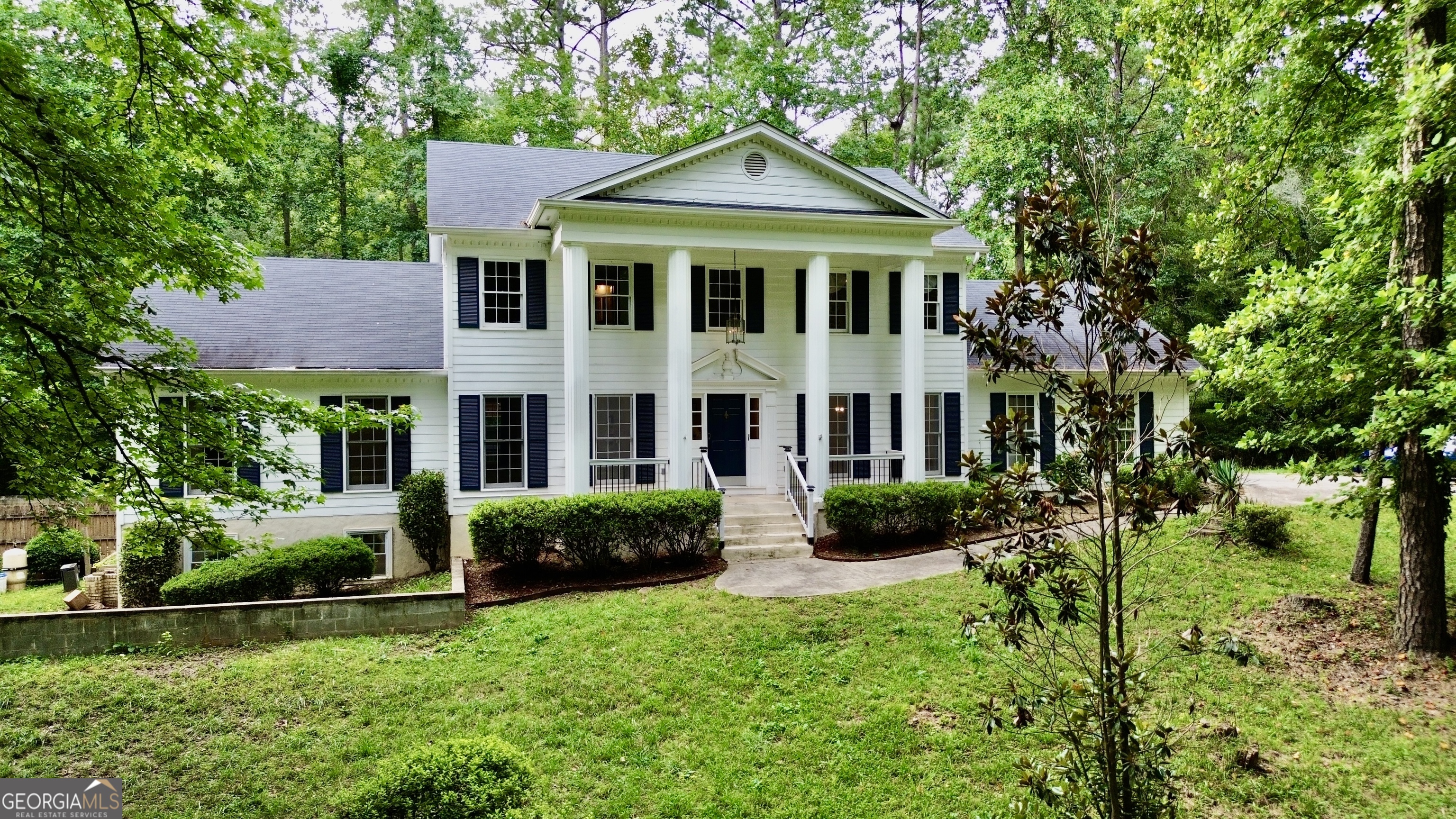 HIDDEN GEM in city of Lawrenceville: One of-a-kind white house resides on 1.33-acre lot in Brookwood High School district, NO HOA. 4 Bedrooms, 3.5 Bath, 2,861 sqft, NO CARPET!. Modern barn house style with Large Master suite on Main! Large deck and large patio! Immerse yourself in nature and peaceful views of Yellow River along the property line. 7 minutes to Brookwood High!! Enjoy your own getaway with Private Pool, Large Deck for any family gathering or party!! Located in flood zone AE with an annual flood insurance premium of $3,000+. Owning this one of a kind house is an opportunity you don't want to miss!!