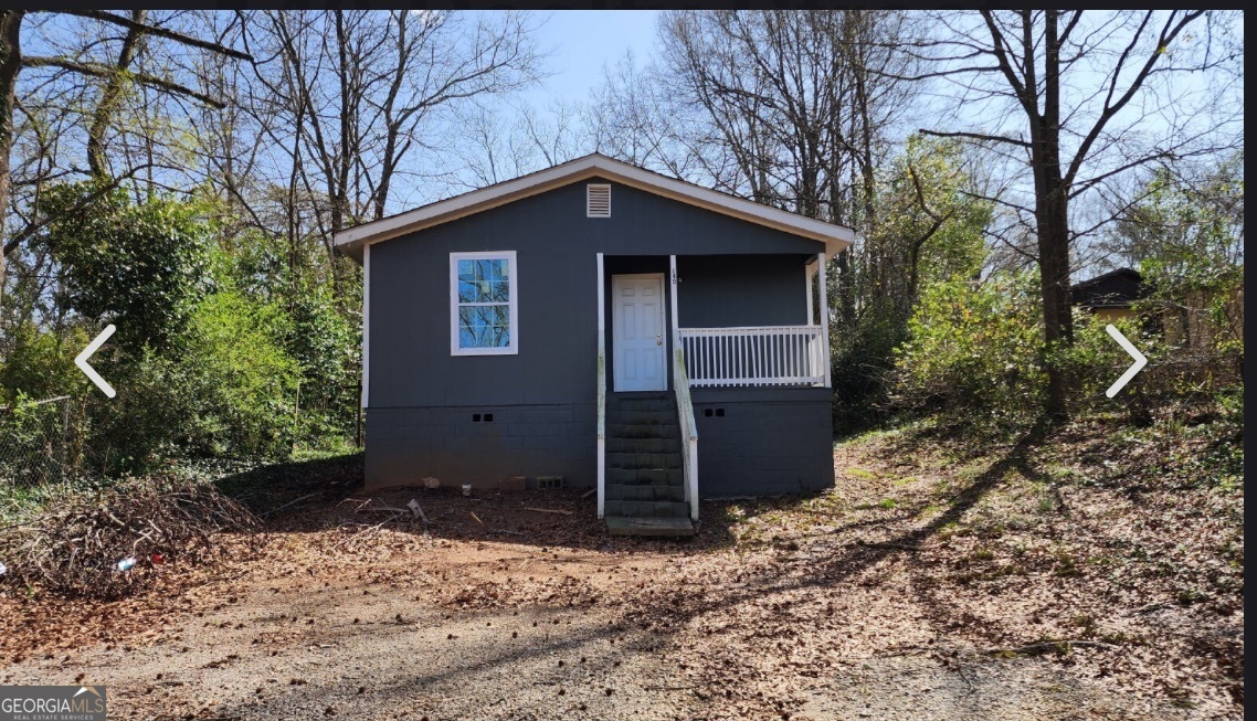 Welcome to this solidly built duplex investment property, located on a corner lot in Griffin, GA. Constructed in 1971, this single-story building offers two spacious 2-bedroom, 1-bathroom units-each with a den, a private entrance (one from Alabama Street, the other from Realty Street), and separate parking. New floors in both units. With its central location and strong rental history, this property is a prime opportunity for investors seeking steady cash flow