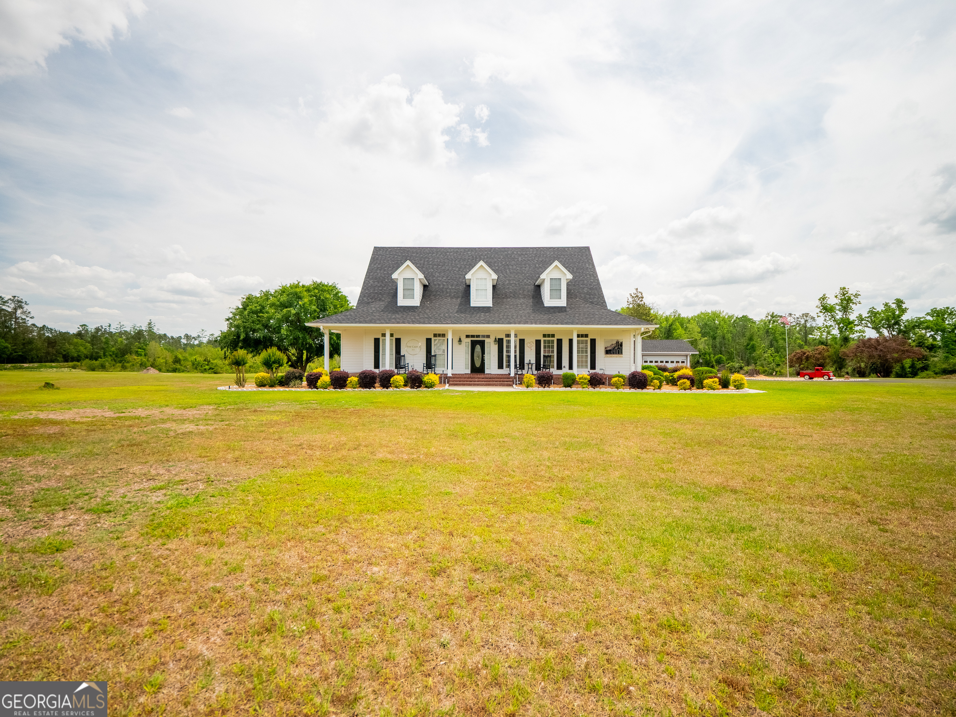 This remarkable modern farmhouse is on almost 40 acres. The home is over 3,500 sq. ft., and it has 3 bedrooms and 3 and 1/2 baths, a large updated kitchen, and a large updated master bath. A brand new 40x60 shop and a metal building venue set up for social gatherings. Too many amenities to list. This property is a must-see. Call and make your appointment today.