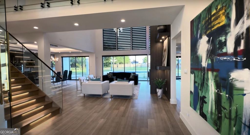 Photo of 6711 Bishop Road, Fairburn, GA 30213 (MLS # 10692524)