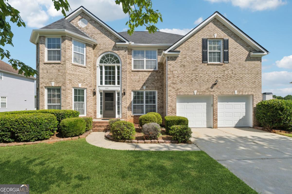 Discover the perfect balance of Comfort, Style, and Functionality in this beautifully renovated 5-Bedroom 3.5-Bath SPACIOUS Brick-Front home with a FULLY FINISHED BASEMENT. Nestled in the highly sought-after St. Martin subdivision in Lawrenceville, this house spans overs 4,600 Square Feet and is located in a community that offers swim and tennis amenities, low HOA fees, and no rental restrictions-making it a rare find for both families and investors. Step inside to a grand 2-story foyer that opens to a SUN-DRENCHED Family Room with soaring ceilings and an abundance of windows. The house has been recently painted to provide a much more open and airy atmosphere, and there are gleaming hardwood floors throughout the main level adding a sense of luxury and elegance. The formal living and dining rooms provide an inviting setting for entertaining, while the gourmet kitchen features upgraded granite countertops, stainless steel appliances, a spacious island, and a breakfast area designed for everyday family meals. There's also a conveniently located half bath on the main level for your friends and guests. Upstairs, the oversized master suite is a true retreat with a spa-inspired bathroom offering frameless shower doors, a soaking tub, dual vanities, and a large walk-in closet. The upstairs has brand new carpet throughout and there are three additional bedrooms providing plenty of flexibility for children, guests, and even a home office or study space. One of the rooms even has a small sitting area with three separate closets within the room! All the secondary rooms have access to an updated secondary bathroom with double vanities along with a separate entrance for the toilet and tub. The laundry room is also located upstairs to avoid having to haul your dirty clothes up and down the stairs every time. The finished basement offers endless possibilities with a bedroom, full bath, and multiple flex spaces-perfect for a theater room, home gym, playroom, or extra storage. The back deck overlooking the spacious backyard completes the home, giving your family the ideal spot for outdoor fun and relaxation. This stunning home is ideal for multigenerational living or growing families-don't miss the chance to make it yours today!