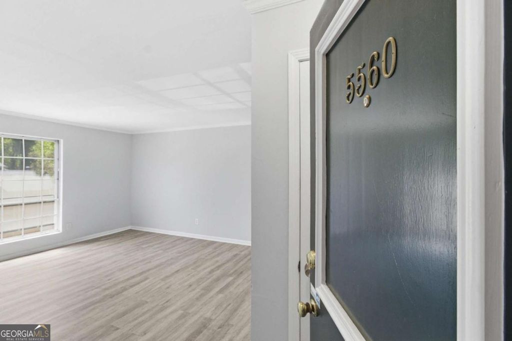 Photo of 5560 Kingsport Drive NE #27, Atlanta, GA 30342 (MLS # 10730860)