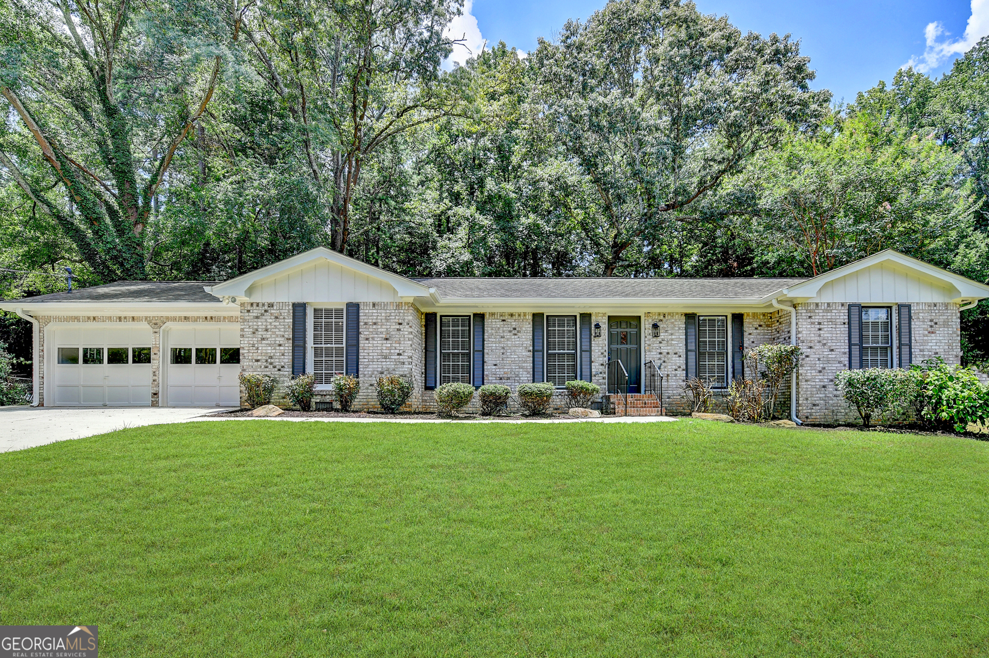 Beautifully Renovated 4-Sided Brick Ranch on Over Half an Acre! Welcome to easy one-story living in this charming and fully updated 3-bedroom, 2-bath ranch home situated on a spacious 0.54-acre lot. Nestled among mature trees, this home offers privacy, peace, and a large front and back yard perfect for gardening, entertaining, or relaxing outdoors. Step out onto the wooden deck patio right off the back of the house and enjoy your morning coffee or evening unwind while overlooking your serene and private backyard. Inside, you'll love the completely renovated kitchen, featuring new cabinetry, granite countertops, Zumpano tile backsplash, champagne bronze hardware, new sink and faucet, a dual-fuel gas range with electric oven, and built-in microwave. The home also boasts refinished hardwood floors, fresh Sherwin-Williams interior and exterior paint, and new upgraded carpet with plush 8 lb. pad in the bedrooms. Other upgrades include: * New water heater and expansion tank * New light fixtures, ceiling fans, and LED recessed lighting throughout * Updated hall bathroom with new vanity and faucet * Enlarged two-car garage with a huge storage room offering tons of potential * Electrical and plumbing pre-inspected * Septic tank serviced and warranted * Termite contract renewed through April 2026 * Major landscaping project completed, including yard clearing and tree removal Located in a highly desirable area with great schools, convenient access to shopping, and easy connectivity to I-78. This turn-key property offers classic charm with modern updates-Welcome Home!