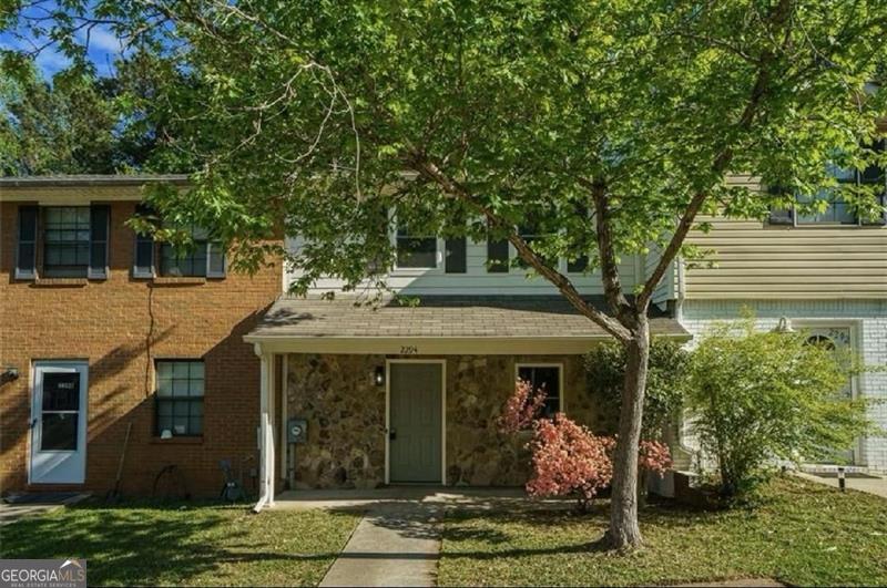 Charming Townhouse - Freshly painted, Updated and move-in ready, this 2-bedroom, 1.5 bath townhouse offers modern comfort in a quiet, convenient location. Both the Interior and Exterior are very inviting