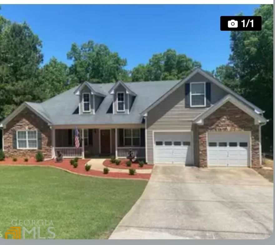 Seller offering $3,000 Closing Cost on this Ranch Home. This gorgeous home is ready for you! Only 5 miles from Indian Springs State Park, High Falls State Park and Dauset Trails with fun activities. This home features a split floor plan, two walk-in master closets, a back door directly off to the master bedroom, two dining rooms (one is being used as an office), 4th bedroom over garage and more! The large front and back porch gives you plenty of outdoor space! The backyard features a fire pit area accompanied with two benches, it is fully fenced, and with this being an established neighborhood you will never lose your view! The refrigerator, dishwasher, microwave, backyard fence and the first level AC unit were replaced in 2021! The upstairs features an oversized 4th bedroom with a walk in closet! This home will not last long, so do not miss out.