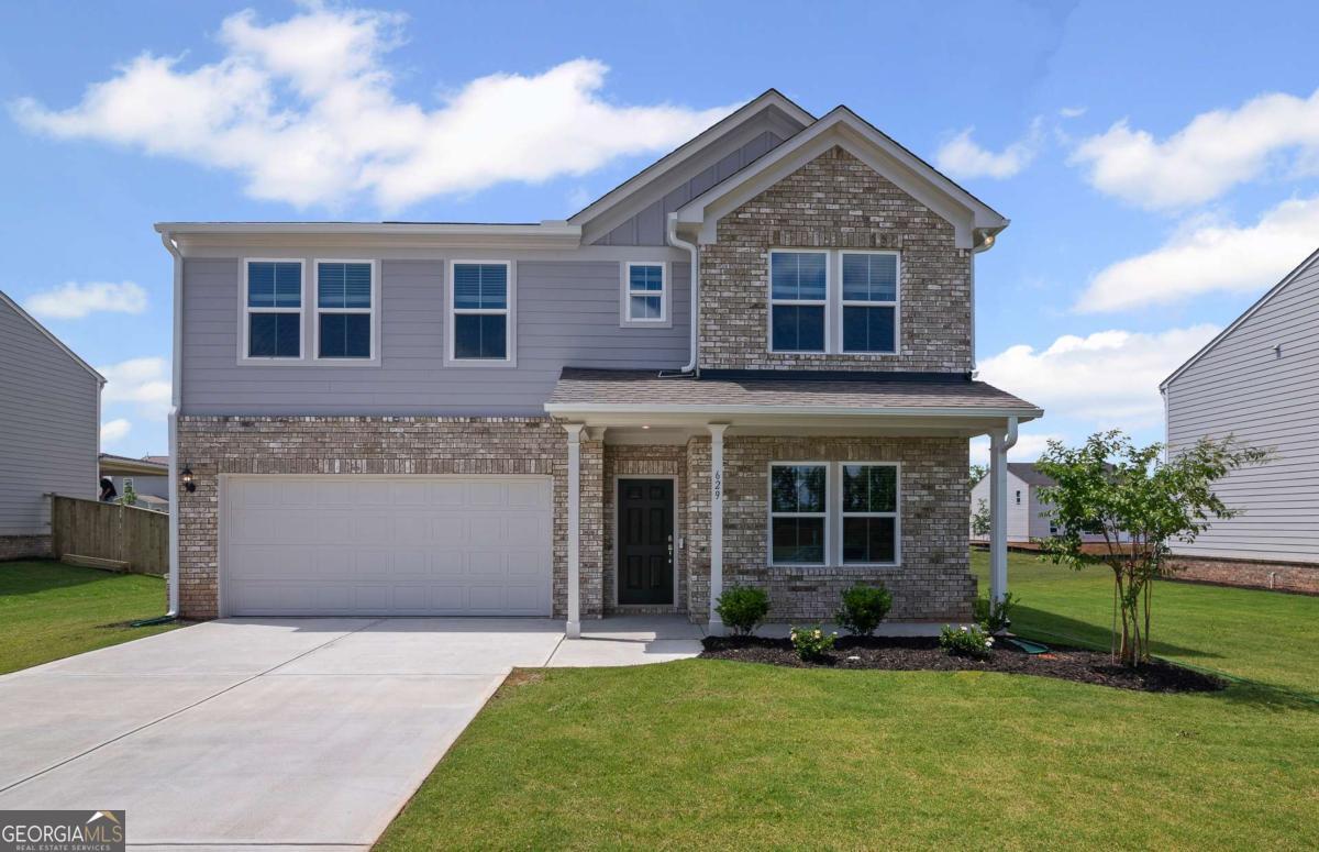 Move-In Ready Now - Pulte Homes Presents The Hampton at Anderson Point Experience refined living in this beautifully designed new construction home near Lake Dow. The Hampton offers an open-concept layout with a chef-inspired kitchen featuring an oversized island, custom cabinetry, and premium finishes throughout. Highlights include a spacious owner's suite with an oversized walk-in closet, a private office, a flexible loft, well-appointed secondary bedrooms with ample storage, and a two-car garage. Located just minutes from historic McDonough Square, Anderson Point provides convenient access to Georgia National Golf Club, Tanger Outlets, Jackson Lake, Heritage Park, and more.