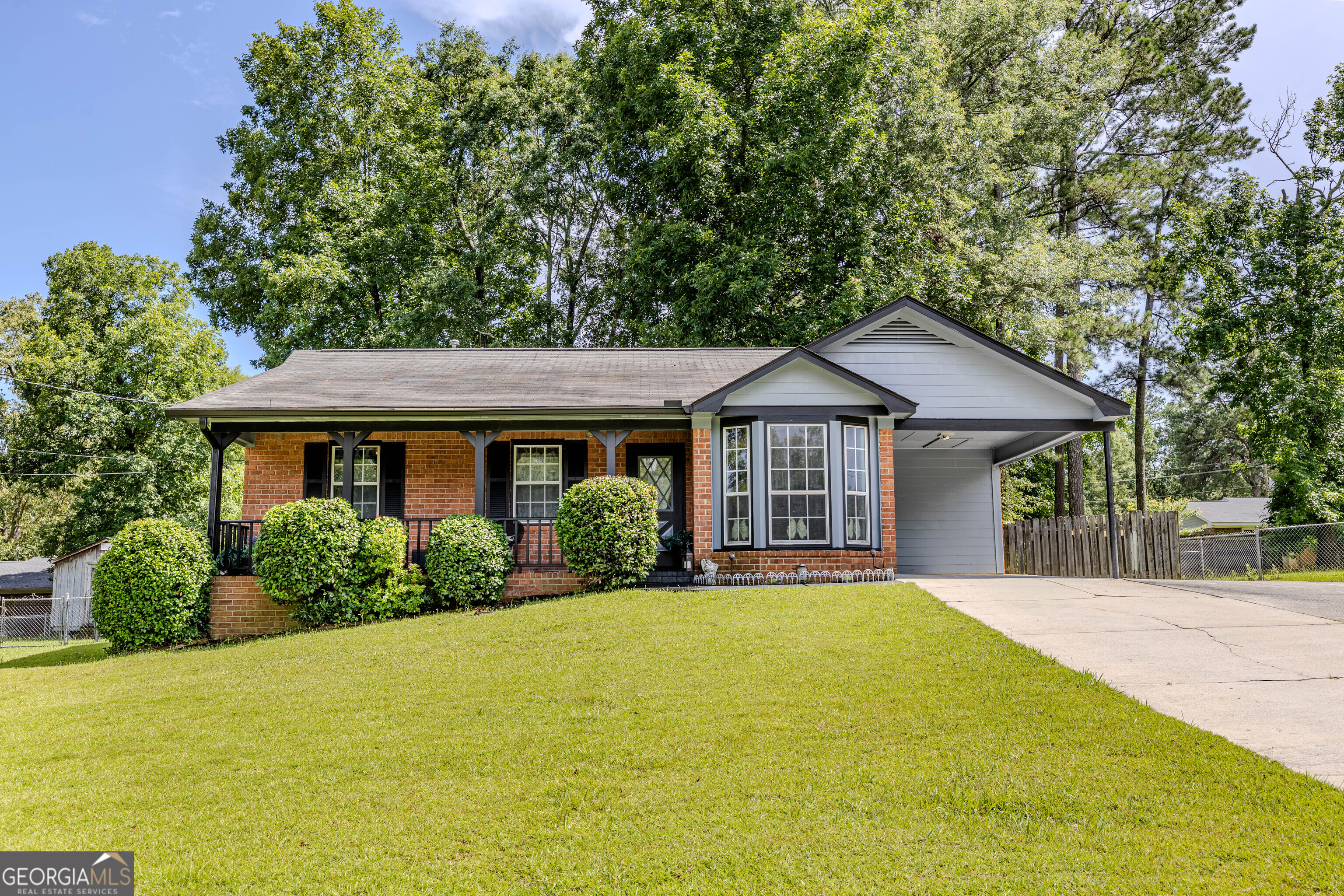 Neat and well-kept Garden Lakes, 3/2 Brick Home. Tile floors throughout. Kitchen includes dishwasher and stove. Family room has vaulted ceiling with exposed beams and wood burning fireplace. Master suite with a trey ceiling, walkin closet and seperate shower. Separate laundry room. The patio and porch look over a shaded and fenced back yard with a storage a building. Don't miss this bargain, it won't last long.
