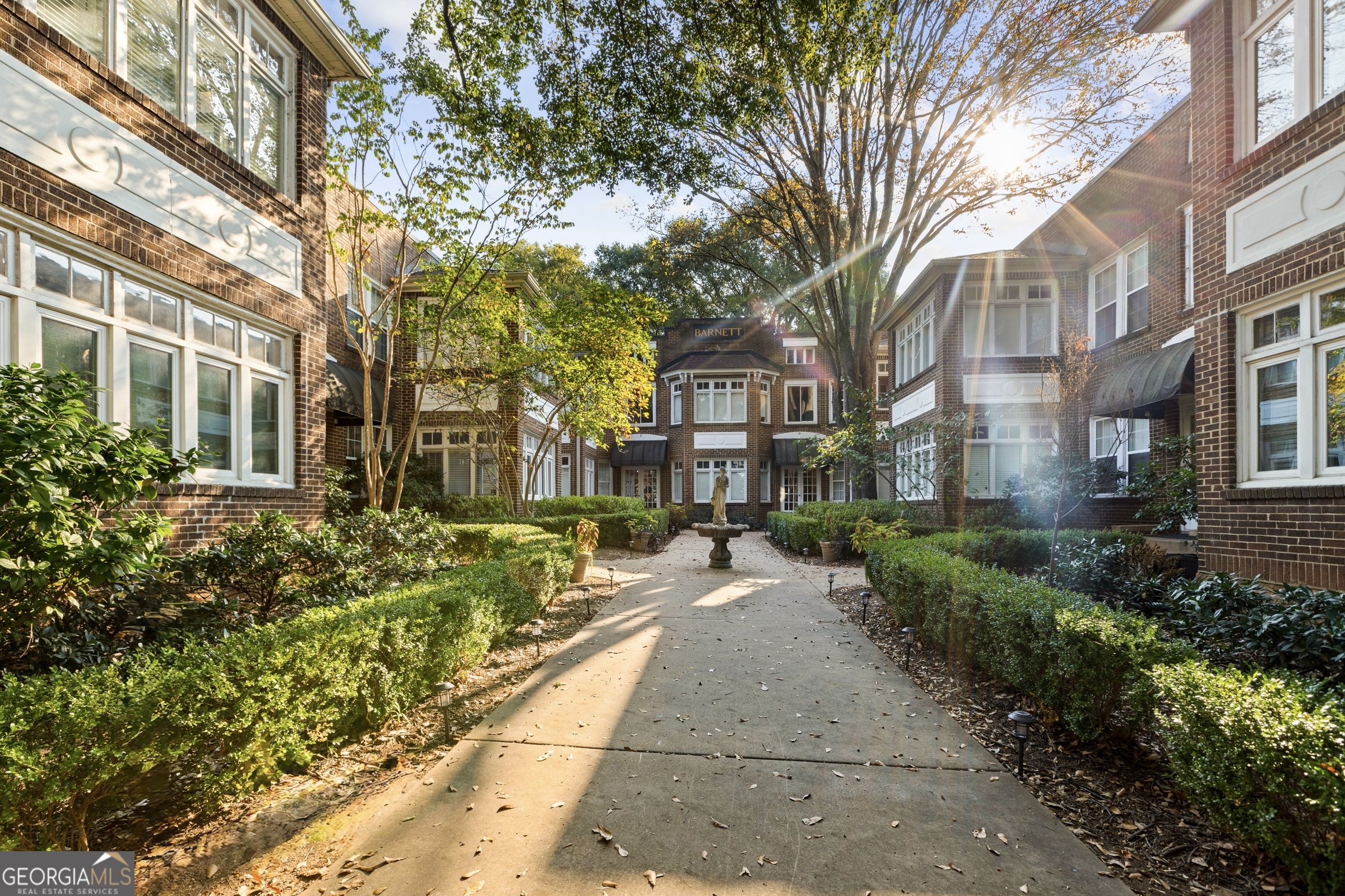 Welcome home to the historic 1940's built community, The Barnett! This adorable 1-bedroom, 1-bath condo is filled with natural light and features stunning hardwood floors, tall ceilings, and the perfect blend of vintage character and modern updates. The spacious kitchen has been thoughtfully renovated with granite countertops, abundant cabinetry, and a classic subway tile backsplash - all complemented by vintage brick flooring that's a nod to its charming past. The bedroom suite offers a walk-in closet, an additional closet, and an efficiently updated bath. The Barnett is a mid-century gem, known for its beautiful original brick facade, timeless architecture, and inviting design. Residents enjoy a secure, fully fenced community with a lovely central courtyard, gated pedestrian access, dedicated and gated parking, additional basement storage, and a very affordable monthly HOA! Located in the historic and highly popular Virginia-Highland neighborhood, you'll love being just steps away from restaurants, bars, shops, and community events. Plus, you're only blocks from Piedmont Park, Poncey-Highland, Old Fourth Ward, Inman Park, Ponce City Market, and the Atlanta BeltLine. Park the car and enjoy the unbeatable walkability and vibrant lifestyle of in-town Atlanta living! *Professional photos to be uploaded Friday*