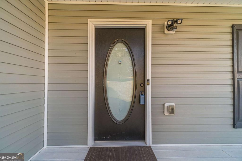 Photo of 583 Embassy Walk, Winder, GA 30680 (MLS # 10689081)