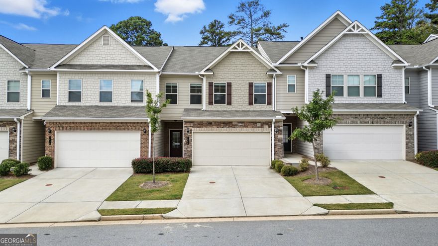 Welcome to this beautiful move-in-ready, like-new 4-Bedroom, 2.5 Bath Townhome. The open floor plan features a spacious Chef's Kitchen with a large island perfect for entertaining and meal preparation, upgraded cabinetry, and all stainless-steel appliances. The Dining Area flows seamlessly to the Family Room and the inviting Patio. Upstairs, retreat to the stunning Primary Suite, featuring a tray ceiling, an expansive walk-in closet, and a luxurious en-suite Bathroom with dual vanities, a shower, and a separate soaking tub. The second level also features three additional Guest Bedrooms, a Guest Bathroom, and a Laundry Room equipped with an HE Washer & Dryer.  The spacious Garage includes a level 2 Tesla charger and additional shelving for storage. Relax outside on the patio and enjoy the fully fenced yard, featuring a newly sodded backyard, perfect for your furry babies. Conveniently located just off Buford Highway and only minutes from both Downtown Norcross and Downtown Duluth, and easily accessible to PIB & I-85. The Home has been thoroughly pre-inspected by Sure Thing Home Inspections, appraised by D.S. Murphy, and the Home is backed by a comprehensive 2-10 Supreme Home Warranty, offering added confidence and peace of mind.