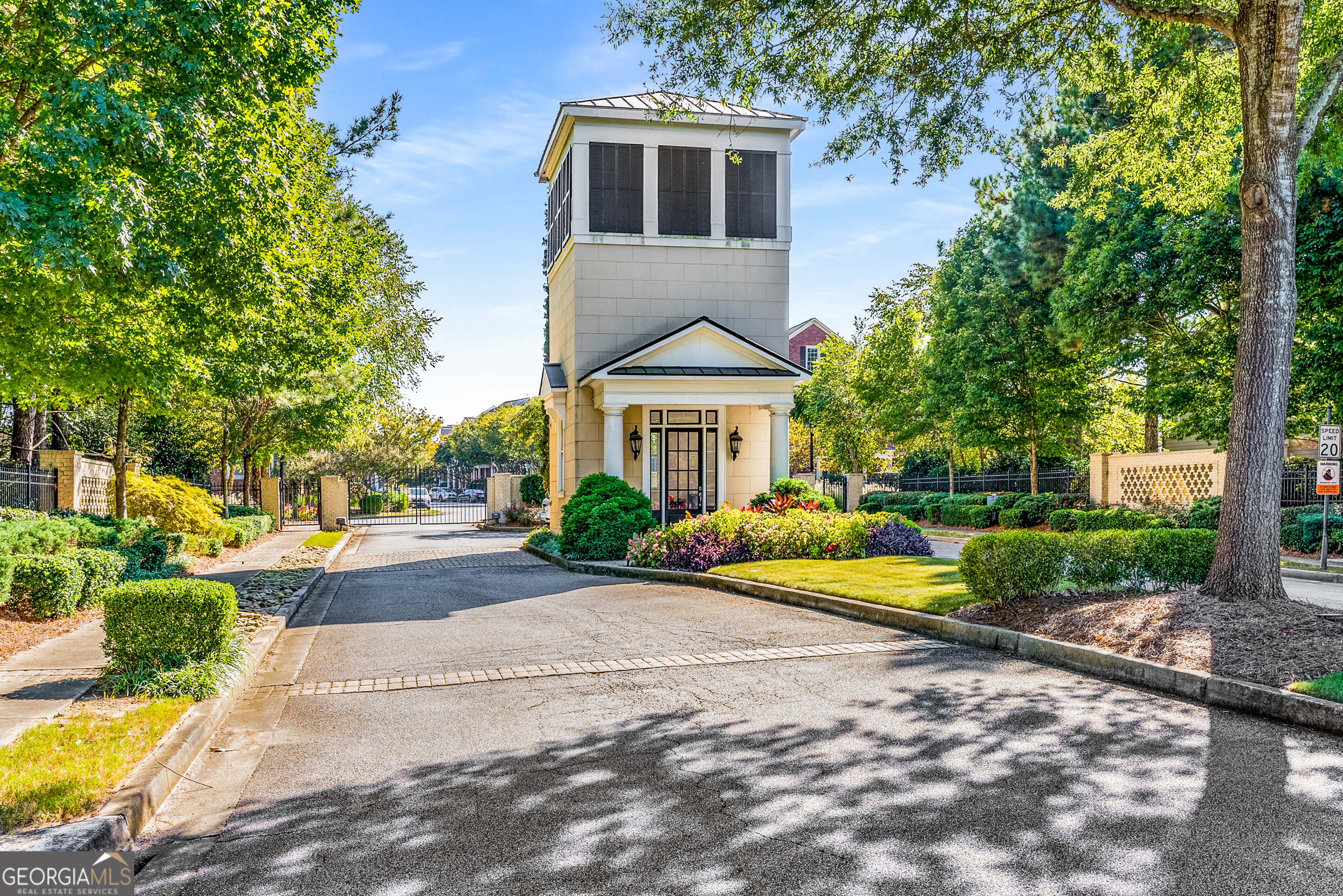 Welcome home to 6254 Village Arbor Ln - where modern living meets unmatched convenience. This beautifully maintained 3-bedroom, 3.5-bath townhome, built in 2015, feels like new construction. From the moment you enter, the elongated foyer welcomes you into an open, sun-filled floor plan designed for both comfort and entertaining. The chef's kitchen flows seamlessly into the dining and family room, where wall-to-wall windows bathe the space in natural light. Step onto your private balcony, surrounded by trees, and enjoy morning coffee or quiet moments of reflection. Upstairs, the owner's suite is a retreat with a luxurious soaking tub, oversized separate shower, and generous walk-in closet. A secondary bedroom with its own bathroom offers convenience for family or guests. The finished walk-out basement offers even more flexibility, making it ideal for a guest suite, home office, or media room. Located in a gated community with amenities that include a resort-style pool, a full-size gym, a club clubhouse with multiple meeting rooms, an event center with a catering kitchen, playgrounds, and tennis courts. Minutes from Hartsfield-Jackson airport, Truist Park, Downtown Atlanta, and plenty of shopping and dining. Don't miss your chance to own a turn-key home in one of the most desirable locations in the metro area
