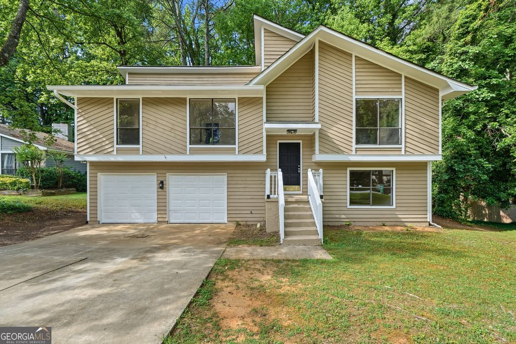 Photo of 996 Park Forest Trl NW, Lilburn, GA 30047 (MLS # 10764867)