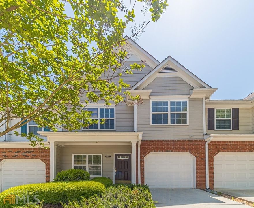 Beautiful Townhome located minutes from The Mall of GA and I-85! Large open kitchen with beautiful, stained cabinets, view to the great room, family room and dining area, walk out onto back patio for grilling and entertaining! HOA maintains roof, landscaping, and exterior maintenance. This is a must see!