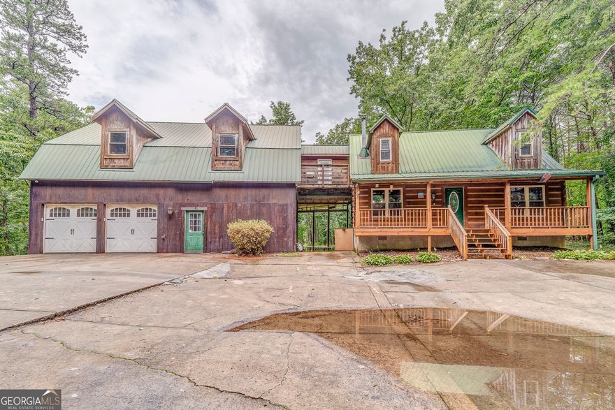 Tucked away on 6.12 peaceful acres in Rydal, this inviting log cabin offers the perfect blend of rustic charm and flexible living space.  With 4 bedrooms, 3 full baths and 1 half bath , additional loft areas, there is room for everyone- whether your need space for working from home, entertaining guests, or simply relaxing. This home showcases soaring ceilings, warm wood finishes, exposed wooden beams and windows that frame the stunning view of Pine Log Mountain.  The main level offers a kitchen, living room, dining area, bedroom and 1 and half baths. Upstairs offers oversized master suite with 2 walk-in closets, separate tub and soaking tub with double vanity and 2 additional bedrooms and a bath. Whether you're dreaming of a quiet homestead or a weekend escape from the city, this property delivers privacy, beauty, and endless potential. Schedule your tour today and see what make this one-of-a-kind property so special.