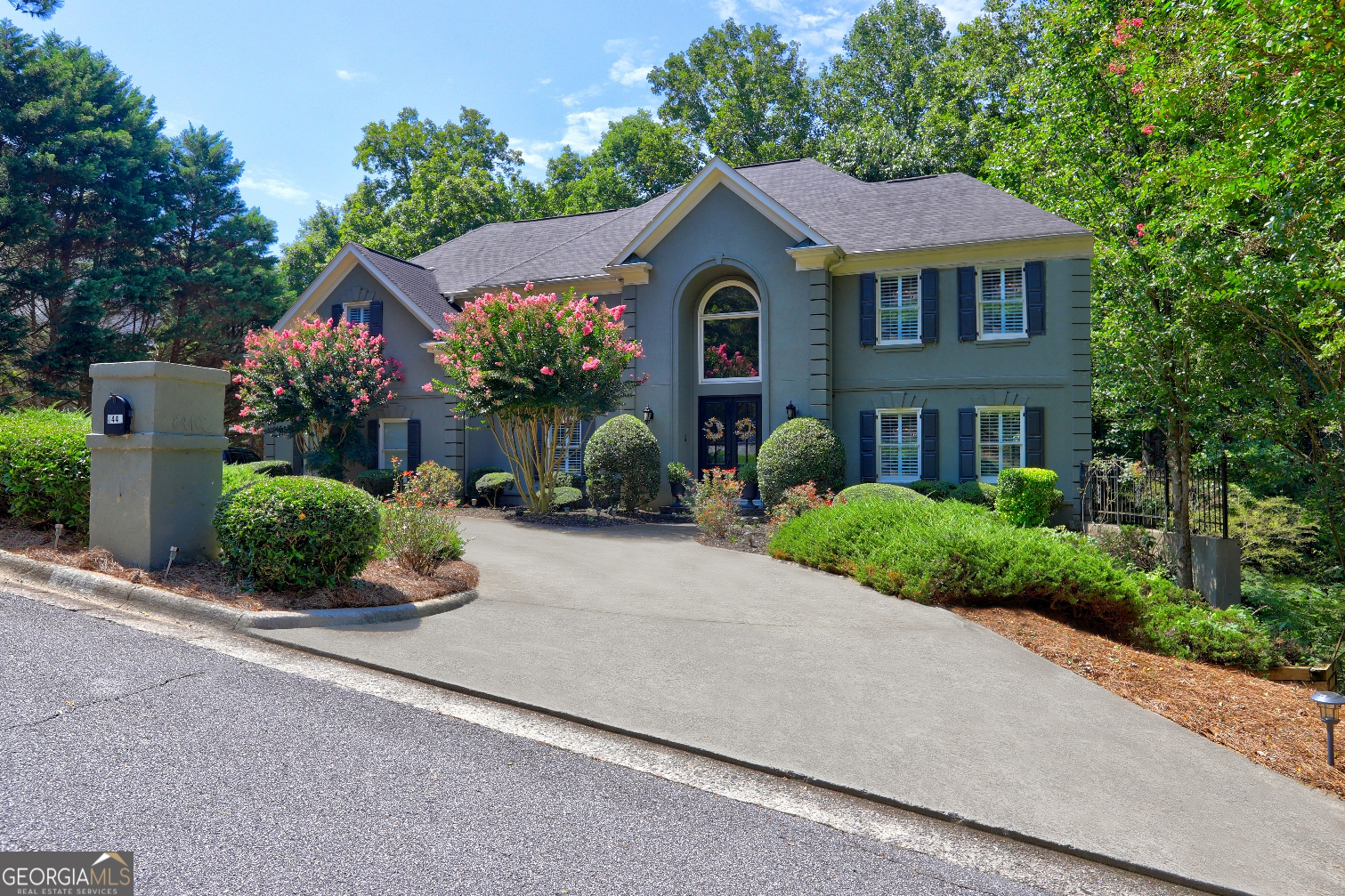 Introducing this Exquisite home in prestigious Huntcliff community that sits on 0.86 acres. This home truly offers LUXURY!! Huntcliff residents enjoy an array of exceptional amenities, such as an equestrian center, golf course, tennis courts, pool, private boat dock for canoeing, playground and clubhouse. In addition, Huntcliff owns 20+ acres of private preservation land along the Chattahoochee river and home to Cherokee Town and Country Club. This home offers a seamless transition between indoor elegance, breathtaking natural surroundings and is tailored for multigenerational living. From the moment you step onto the front porch, this gorgeous home will be calling your name. The grand foyer entrance with high ceilings leads the way to a stunning formal living room, an oversized dining room which brings you to a vast open concept living space to include a beautiful gourmet eat-in kitchen with beautiful counter tops, large center island, abundance of white cabinetry and elegant built in high end stainless appliance packages. The great room with fireside that opens up to a large deck where you can entertain or relax with a glass of wine after a long day. The Main level also features a spacious bedroom with full bath great for in-laws or guest. Meandering up the hardwood stairs or stairwell off the kitchen you will find the gorgeous oversized owners retreat built for two complete with a large walk in closet and a renovated en suite offering massive two separate vanities, relaxing soaking tub and a nice seamless glass surround shower. The spacious secondary bedrooms have high ceilings and walk-in closets; one offers a private bath the other secondary bedroom share a Jack and Jill with full bath. Let's not forget the terrace level where you will find the mammoth unfinished daylight basement is studded for a full bath, ready to finish to fit your desires with over 2400 square feet and 16 foot ceilings perfect for theater, game room in-law suite or whatever you can imagine. This masterpiece is truly an entertainers dream and will not disappoint. Other notables include: New water heater, New furnace and HVAC system, professional lighting package, front and back, beautiful landscape yard, 12 foot ceilings First and second level of the home, Basement 16 foot ceiling and so much storage space.