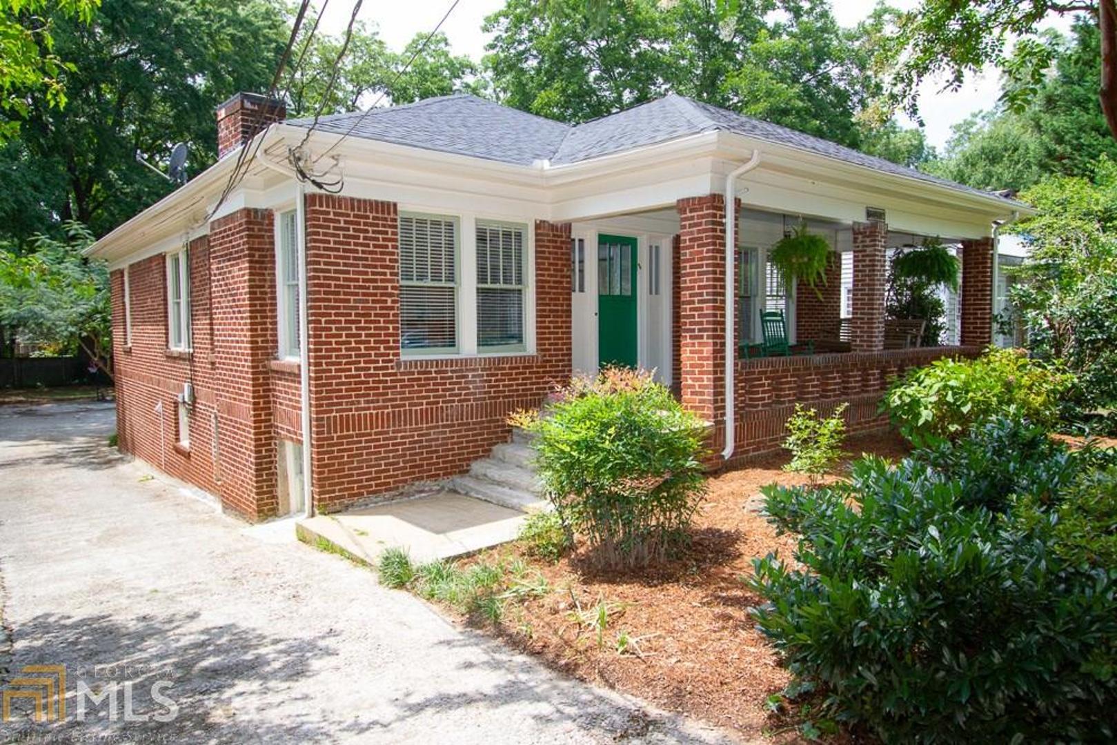 Hard-to-find 3br/2ba brick bungalow in the heart of Oakhurst, with a even harder-to-find basement apartment! This home oozes charm, with high ceilings, original hardwood floors, craftsman trim details & fantastic natural light. Excellent flow from living room to dining room to large eat-in kitchen. Bonus sunroom opens to expansive rear deck. Deep level back yard features a wide parking pad for 2+ cars. BASEMENT APARTMENT features living room, 2 bedrooms, kitchenette, laundry & full bath. Large basement storage room. Easy stroll to Oakhurst Village, McKoy Park, and Decatur schools K-12!