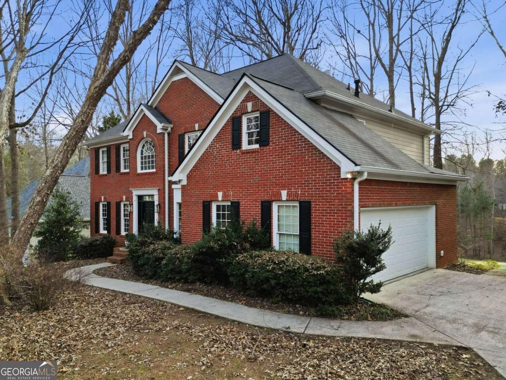 Photo of 302 Mosswood Court, Woodstock, GA 30189 (MLS # 10660776)