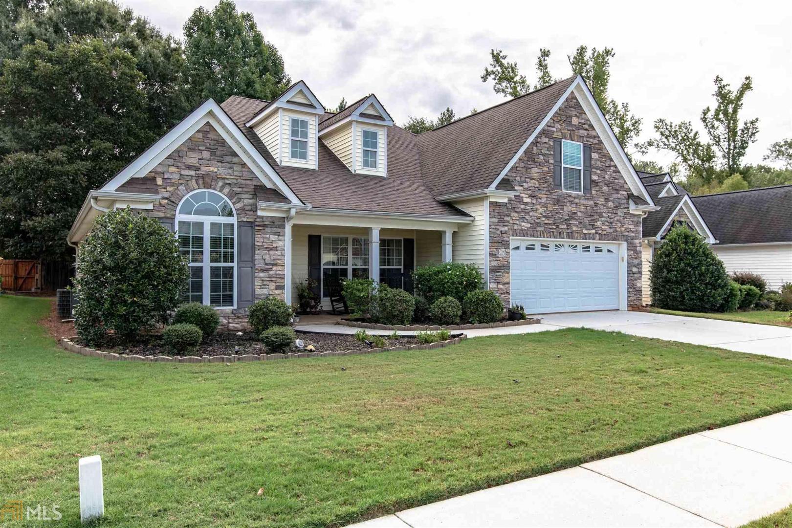 This one is waiting for you! This 4 BR/3 BA home boasts an open floor plan with Owner's Suite on the Main Level!! Owner's Suite features trey ceiling with Garden Tub and Separate Shower in the Owner's Bath...and a walk in closet. Main level also has its own private office. Dining Room, Living Room have new Hardwood Floors...Kitchen with Breakfast Bar, Eat In Kitchen area SS Appliances. Upstairs is a Bedroom with its own full bath and a large Bonus room. Great floor plan with a private backyard! It won't last long!