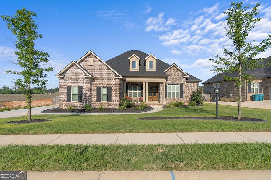 This is a MUST-SEE HOME! Impeccably maintained with impressive upgrades. Featuring 4 spacious bedrooms, and 3.5 baths including an ensuite, and convenient office space.     Enter through the foyer and be greeted by the elegant formal dining room, featuring arched, columned entries and coffered ceilings. The heart of the home lies in the remarkable kitchen, complete with beautiful cabinets and an oversized kitchen island, overlooking the quaint breakfast area and entertaining great room with a gas log fireplace.    Retreat to the private owner's suite, where you'll discover a luxurious bath, grand master closet, spa tub, and a walk-in tile shower. Outside, the game-day porch offers the perfect spot for grilling and outdoor activities, all within the confines of the privacy-fenced backyard, enhanced by a convenient sprinkler system.     This full 4-side brick home not only boasts timeless elegance but also exceptional energy efficiency, with a monthly average electric bill of just $83 during the summer months and $125 during the winter months. Plus, enjoy the added perk of no city taxes and the convenience of being close to everything you need!    Don't miss the chance to make this your forever home. Schedule a viewing today and experience this must-see home.