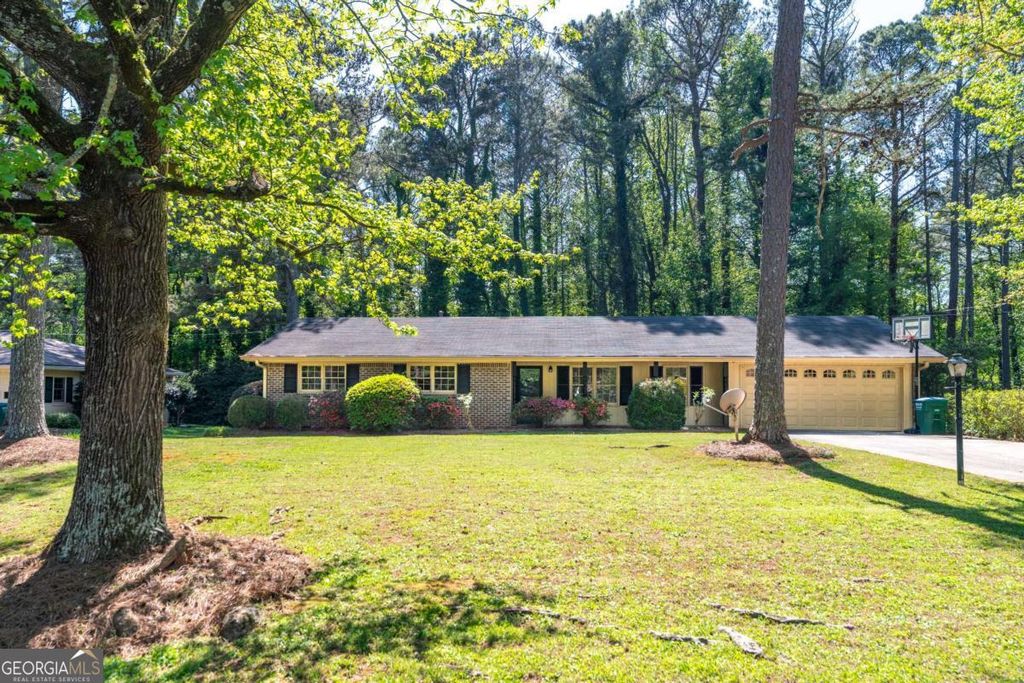 Photo of 1407 Ridgewood Drive SW, Lilburn, GA 30047 (MLS # 10730427)