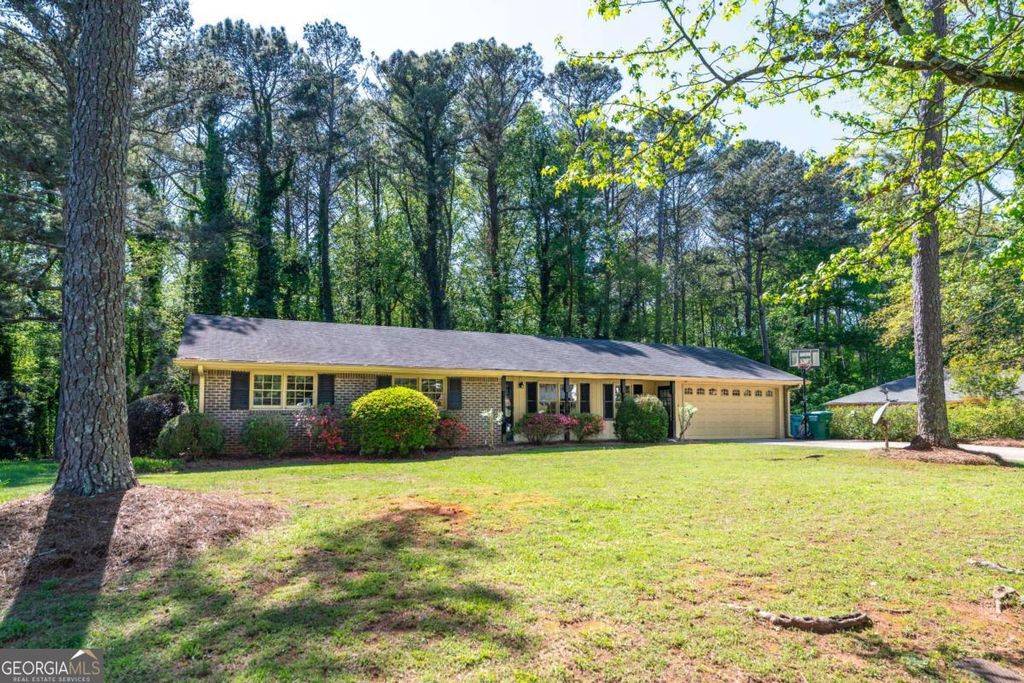 Photo of 1407 Ridgewood Drive SW, Lilburn, GA 30047 (MLS # 10730427)