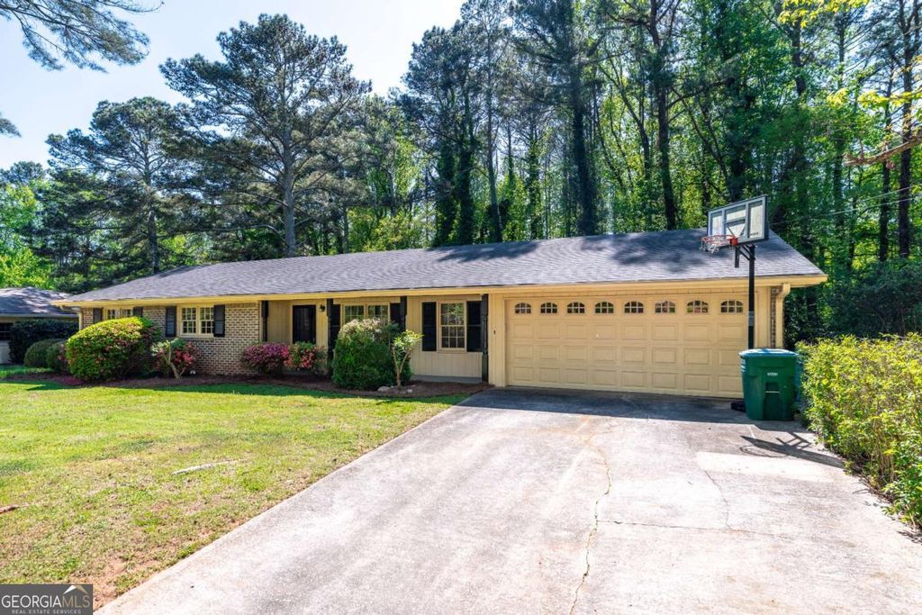 Photo of 1407 Ridgewood Drive SW, Lilburn, GA 30047 (MLS # 10730427)