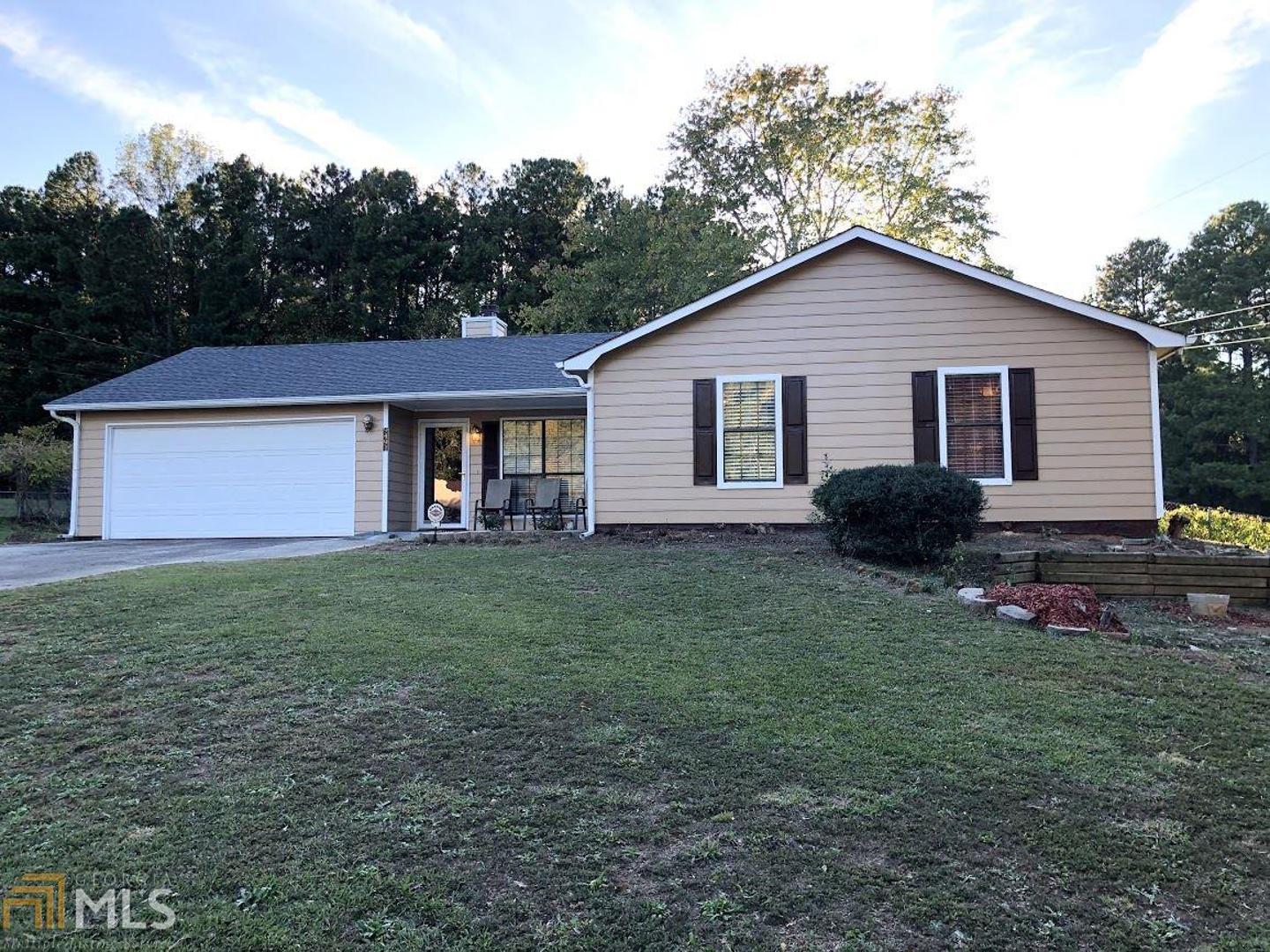 Buyer couldn't close so you have another opportunity to purchase this home for the holidays! Newly renovated with new roof, updated kitchen and baths, new laminate flooring throughout the home, updated lighting, and more! Move-in ready, this home is conveniently located close to shopping and schools. The minute you enter this home, you feel the inviting space of the open floor plan. Sit and relax in the living room in front of the fireplace on those chilly nights. The beautiful kitchen is open to the breakfast area and dining room perfect for entertaining.The bedrooms provide lots of space for furniture and storage. Both bathrooms are spacious. Large laundry room off the breakfast area. If that isn't enough, this home offers a huge sunroom opening to a huge deck. The backyard has a great playfort for the kids and two large storage buildings. Don't miss out on this wonderful home! Call to schedule a home tour today!