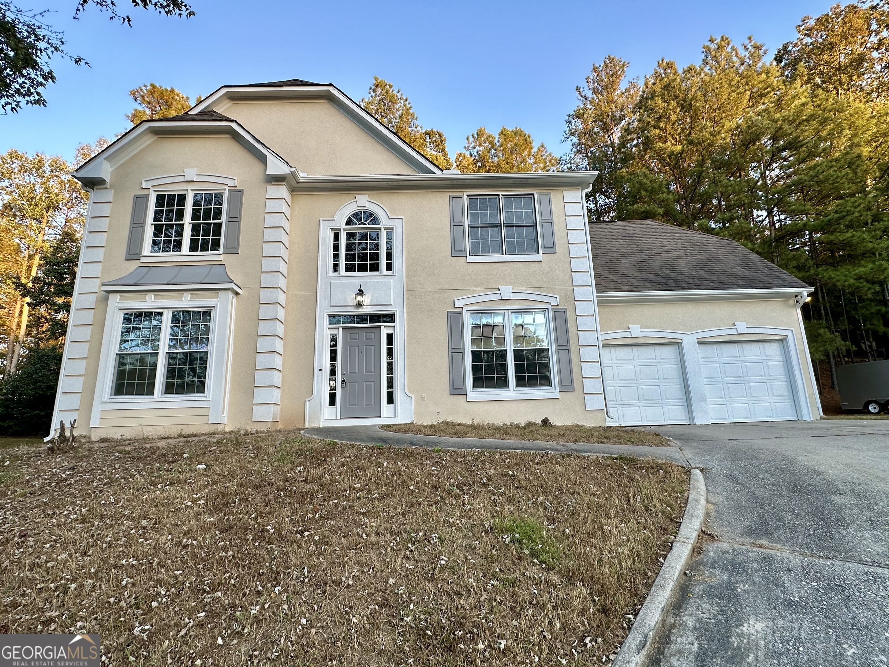 Welcome Home to 355 Bordeaux Court SW! This beautifully refreshed 4-bedroom, 2.5 bath home offers modern updates and a move-in-ready feel in a quiet, established Atlanta community. Boasting new interior and exterior paint, brand-new luxury vinyl plank flooring, and new carpet throughout. The spacious kitchen features an island to gather around as gourmet meals are prepared, and the seller is offering a $5,000 credit toward cabinet upgrades, allowing you to customize the space to your taste.  Enjoy a bright, open floor plan perfect for entertaining, with a comfortable family room showcasing a fireplace, separate formal dining area, and generously sized bedrooms upstairs. The primary suite includes an en-suite bath and ample closet space. Outside, the private backyard and two-car garage with a new garage door operating system completes this charming home.  Conveniently located near shopping, dining, and major highways, this home combines comfort, style, and value that's ready for its next owner!  Don't miss this opportunity, schedule your showing today!