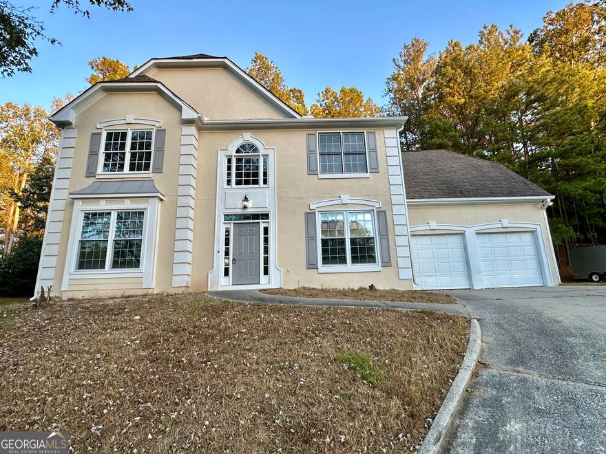 Welcome Home to 355 Bordeaux Court SW! This beautifully refreshed 4-bedroom, 2.5 bath home offers modern updates and a move-in-ready feel in a quiet, established Atlanta community. Boasting new interior and exterior paint, brand-new luxury vinyl plank flooring, and new carpet throughout. The spacious kitchen features an island to gather around as gourmet meals are prepared, and the seller is offering a $5,000 credit toward cabinet upgrades, allowing you to customize the space to your taste.  Enjoy a bright, open floor plan perfect for entertaining, with a comfortable family room showcasing a fireplace, separate formal dining area, and generously sized bedrooms upstairs. The primary suite includes an en-suite bath and ample closet space. Outside, the private backyard and two-car garage with a new garage door operating system completes this charming home.  Conveniently located near shopping, dining, and major highways, this home combines comfort, style, and value that's ready for its next owner!  Don't miss this opportunity, schedule your showing today!