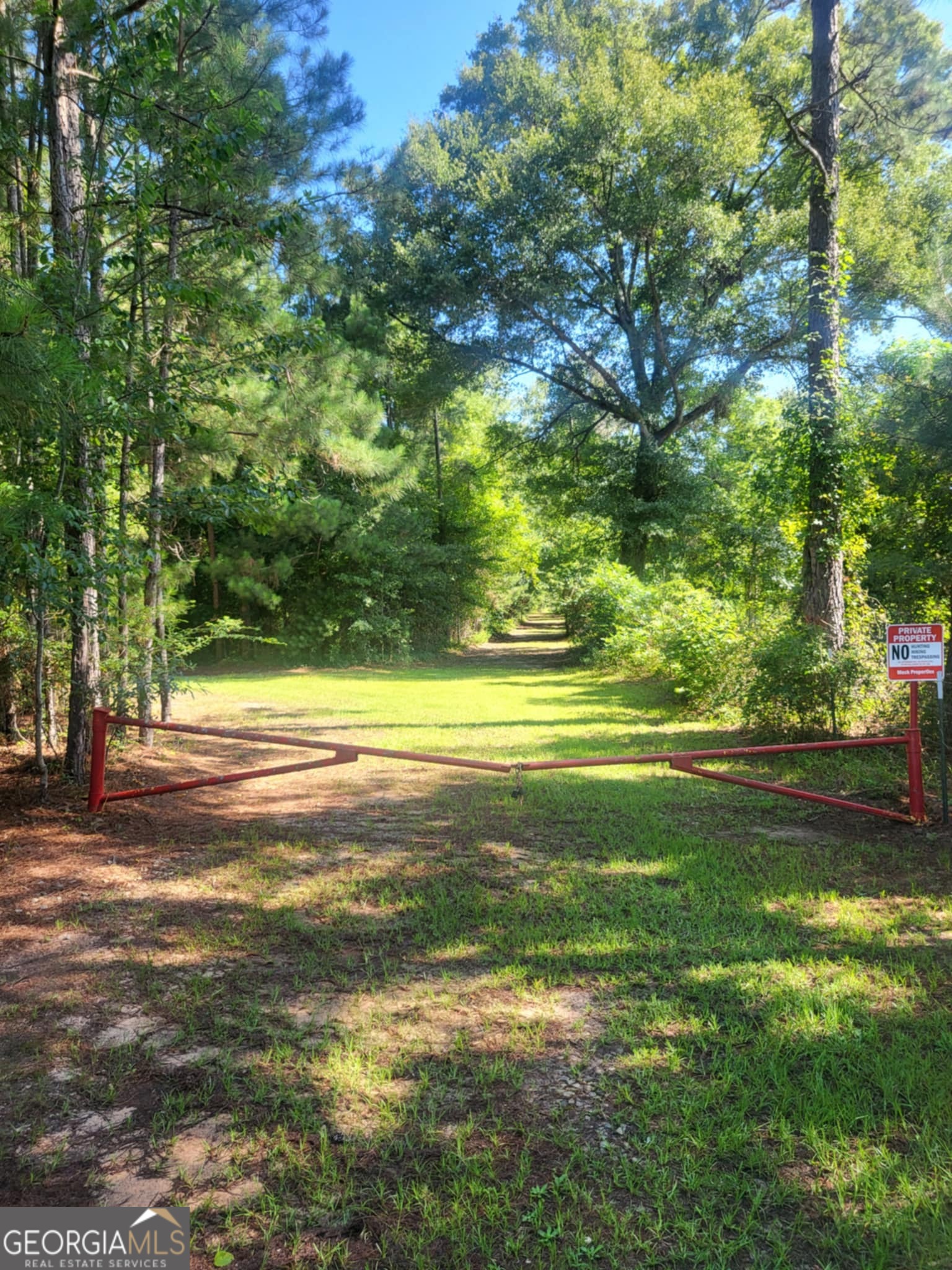 Rare opportunity to by a true turnkey hunting/recreation oasis. Purchase includes 14.28 acres parcel 92 3Hand 114.8 acres parcel 92 2.Welcome to hunting heaven. An abundance of deer, turkey, hogs and even quail can be found in the pines and hardwood bottom. A timber cruise was done 12/24. Big Creek runs the boundary, and other natural springs and water can be found throughout the property that bring in ducks daily. All stands and feeders will stay. This is the 3rd year of feeding 4s protein, 200lbs per week. The 2018 Coachman Catalina, John Deere tractor, John Deer Buck4-wheeler, John Deere Gator, grills, smokers, attachments, everything remains. Once a lifetime opportunity.