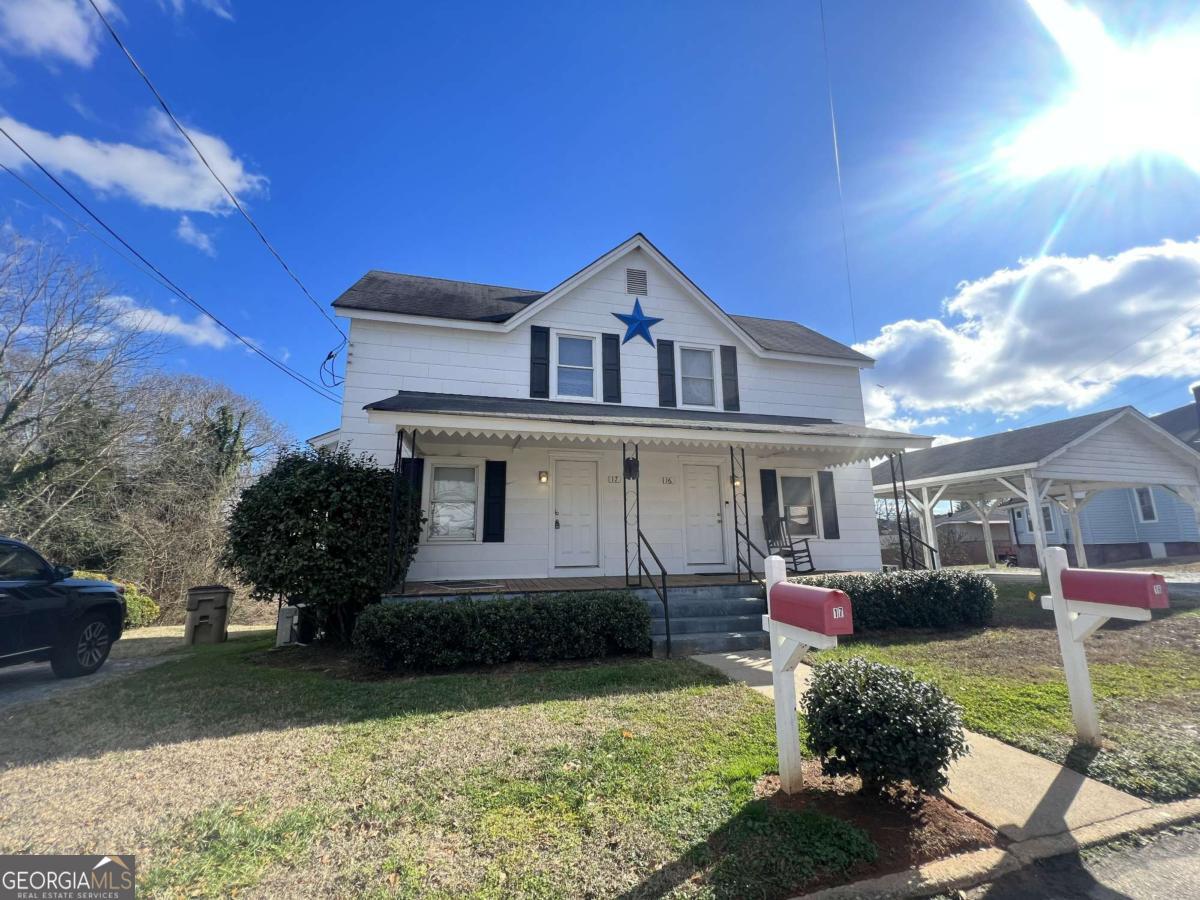 1 bedroom, 2 full bath duplex unit. Rent includes Power, Water, Trash & Landscaping. Main level has living room, kitchen, laundry room and full bath. Upstairs has bedroom and full bathroom. Recently renovated. Move in Ready. Walkable to New Publix Plaza!