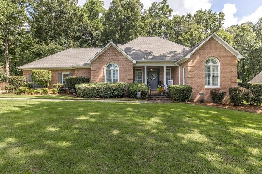 This beautiful 3 bedroom 2 bath home is located in the stunning Barrington Hall Subdivision.  This lovely home has many upgrades to include real hardwood floors, built ins on either side of fireplace, smooth ceilings, formal dining room, updated kitchen with granite, stainless steel appliances, butlers pantry, laundry with cabinets, 2014 -roof, 2013-AC, 2020 hot water heater, sunroom with updated windows, updated sunroom AC, UPDATED master bath with tiled shower, granite, vanity, clawfoot tub, and built in linen.  Sunroom over looks the tranquil backyard with shed that stays as well. Barrington Hall is a golf course community conveniently located off of Zebulon Rd in North Macon. County taxes only! Call us today for your personal tour.