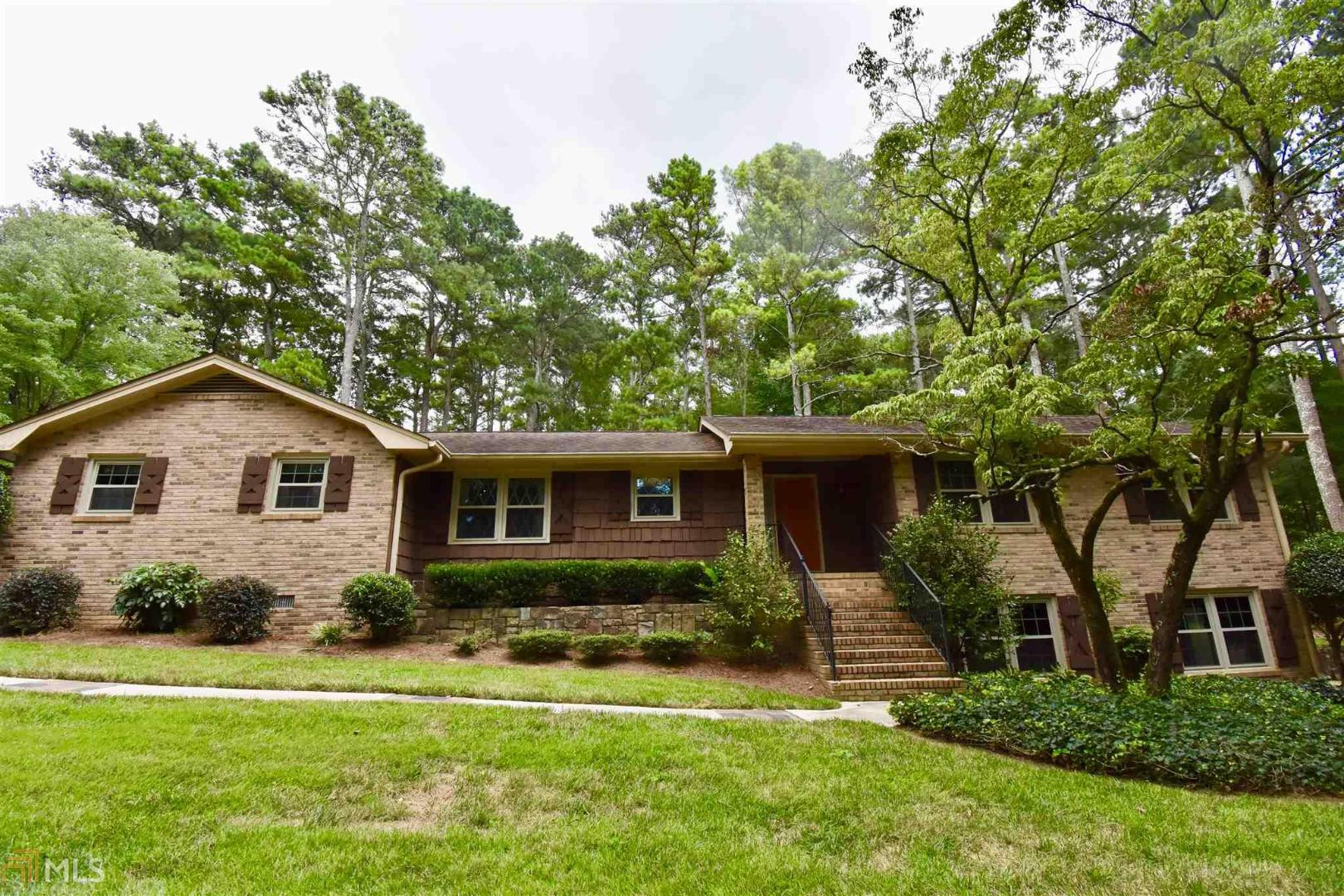 If you are looking for privacy and tranquility that is convenient to schools, shopping, dining, and highways, then this special home is a must see. Sprawling 4 side brick home on a finished basement is situated on a gorgeous 3 acre lot. Meticulously maintained and move in ready. Gorgeous kitchen with stained cabinets, quartz counters and sleek black appliances. Separate dining room overlooks the spacious family room with fireplace. Walk out to the private patio. The perfect place to entertain family and friends. Master bedroom on main level with a luxurious andspacious updated Master Bath. 2 guests bedrooms and full bath on the main level. Lovely FINISHED BASEMENT could be a perfect TEEN or IN LAW SUITE. Large bedroom, full bath, second family room with brand new flooring and island with wet bar. Brand new double doors leading to another private patio area. This special home has new flooring thru out, new thermal windows and newer HVAC. Square feet does not include finished basement. This special home is a MUST SEE!!!!