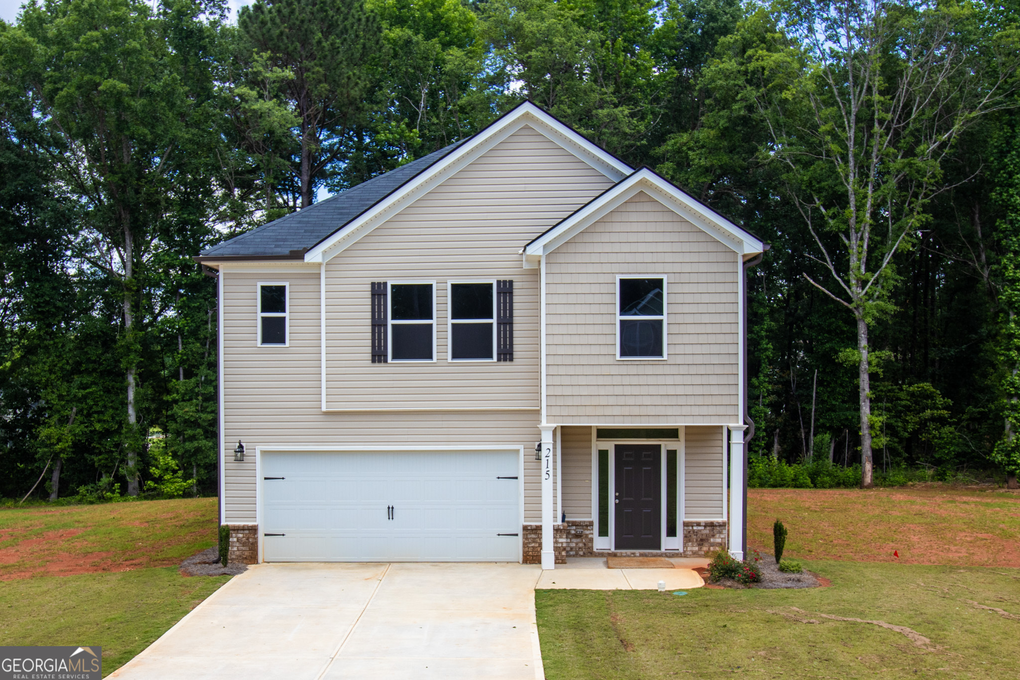 Welcome Home to this new 2-story home with 4 bedrooms! Located in a well maintained community with no HOA. Large foyer area offers powder room and then opens to the spacious family room. The island kitchen offers a pantry, recessed lighting and is open to the dining area and family room. The primary bedroom is located upstairs and offers a walk-in closet, seperate shower, double vanity, and garden tub. Additional 3 bedrooms, 1 full bathroom, and laundry area are located upstairs. Standard features include low maintenance vinyl & brick exterior, granite countertops, wood cabinets, LVP and carpet flooring, along with brushed nickel finishes.