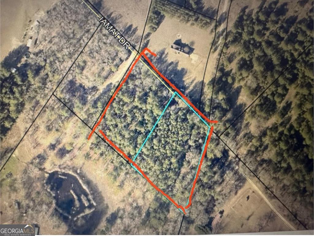 4.27 acres of unrestricted land!! Great place to build a home, place a mobile home or modular home!! Property is unrestricted and ready for it's new owner! Property consists of two tracts of land totaling 4.27 acres. Land is off of Mclendon Road...down Jamat Dr. Take Drive/Lane all the way down until it ends and you run into land listed as Jusal Ln.