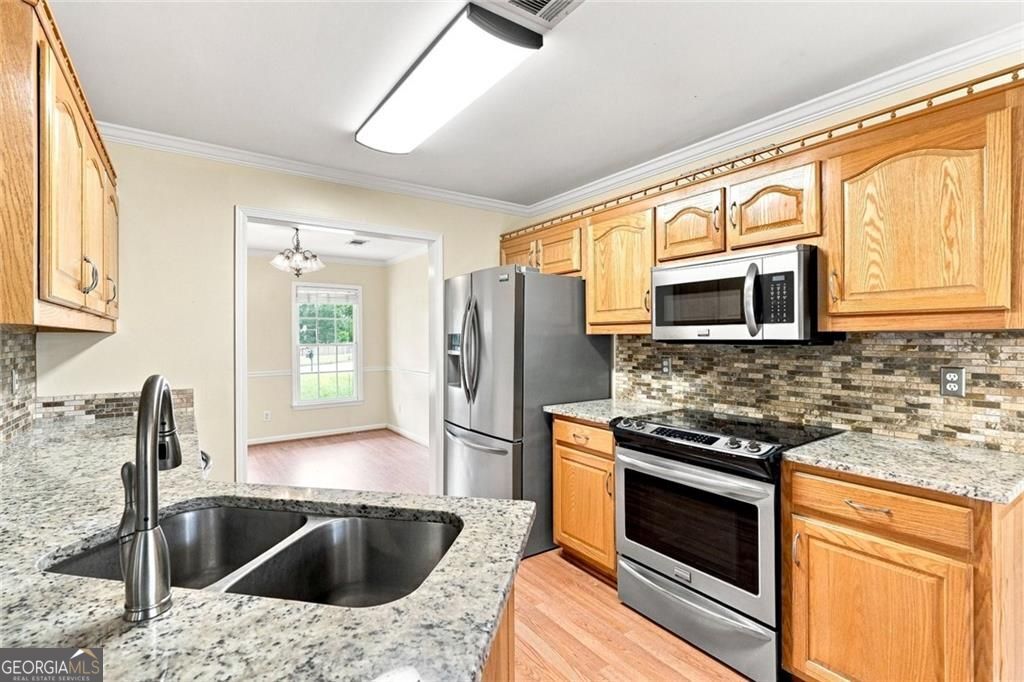 Photo of 2232 Woodbriar Drive, Buford, GA 30518 (MLS # 10839728)
