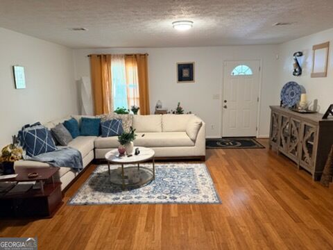 Photo of 1452 NE BIG BEAR Cv, Conyers, GA 30012 (MLS # 10870664)
