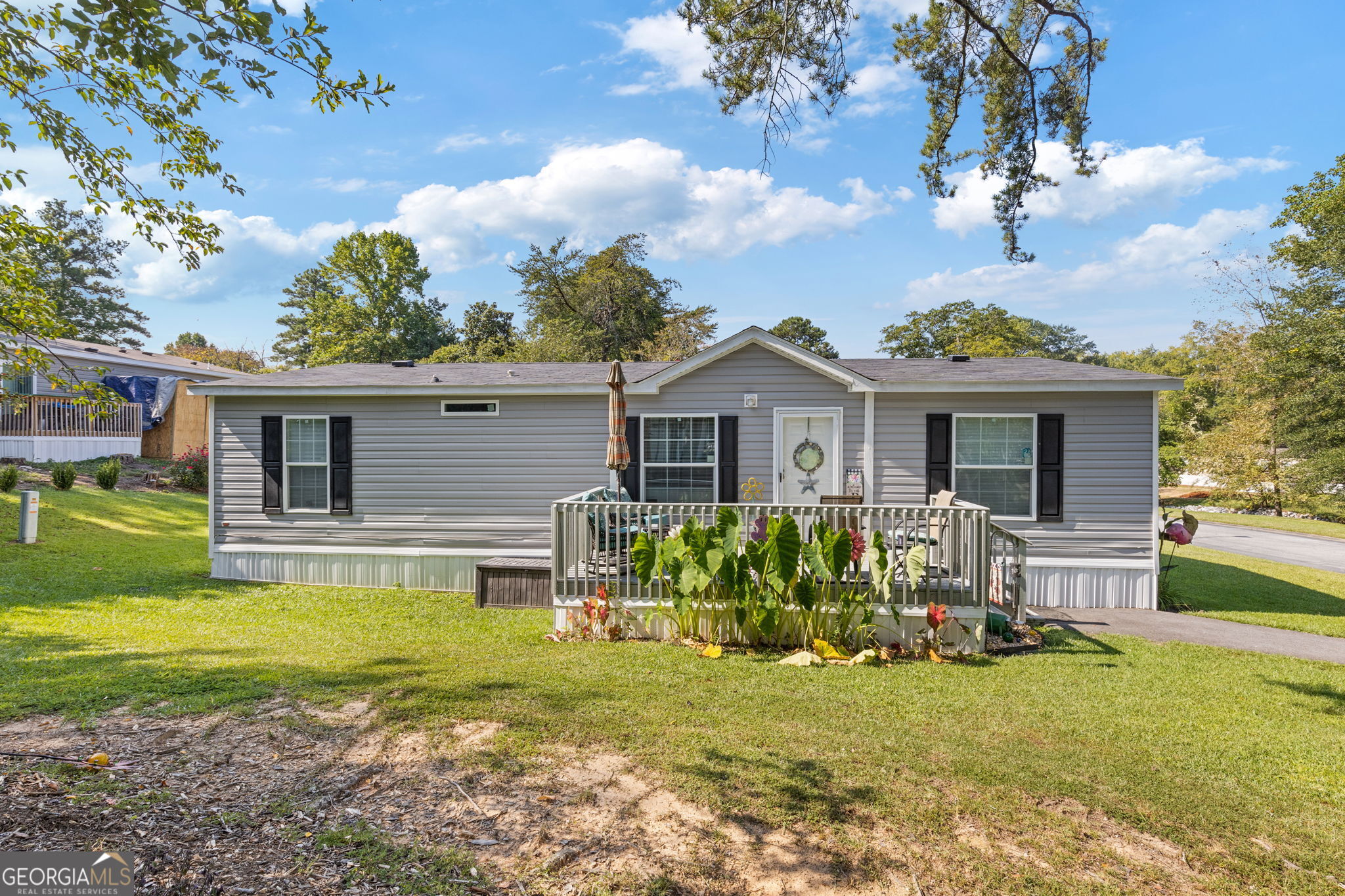 Welcome to this stunning 2023 Double-wide home, located in the highly sought after 'The Meadows Community'. The open concept living area showcases the beautiful kitchen with white cabinets, and newer appliances. You'll enjoy the roommate type floor plan with a primary bedroom with large en-suite which features a double vanity, soaking tub and over-sized shower along with 2 additional ample size bedrooms. There are two decks and a small garden, to enjoy the outdoors. A shed is also conveying with the property. The community amenities include a clubhouse, pool, lake with fish, playground & basketball court. Monthly lot fees are mandatory. Buyers must go through a background check as well as a credit check to be approved by the community, as they retain ownership of the lot. The buyer will own the home (not the land) and has the right to move the home if desired. Move-ins are on the 1st of the month only. Lot fee is $675 per month.