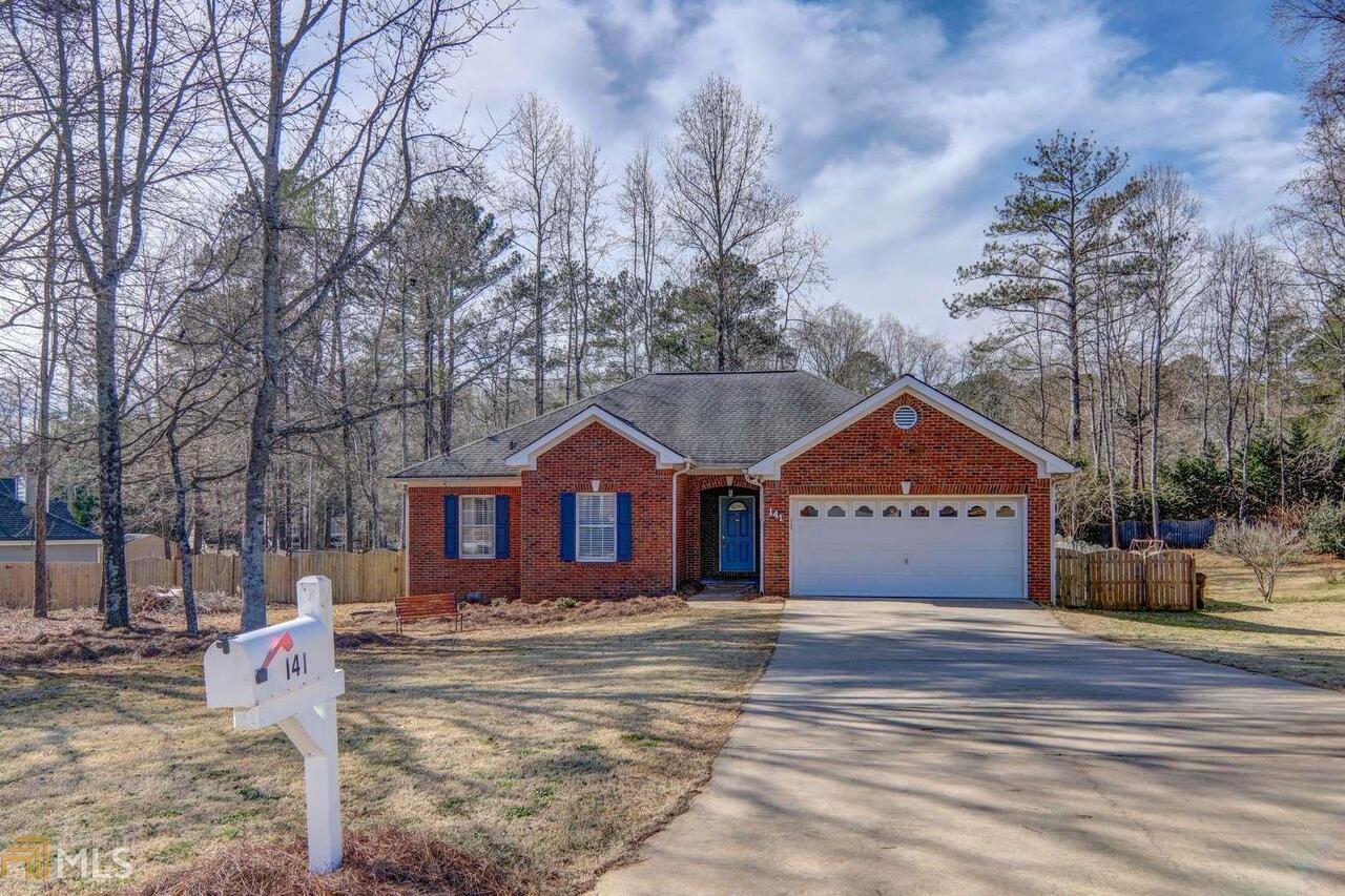 You will love this delightful cottage home with spacious rooms and a lovely fenced yard. The kitchen extends into a workspace area, perfect for a home office or use the extra counter space for cooking. Three bedrooms and two baths on one floor. Convenient location is close to shopping and the interstate.