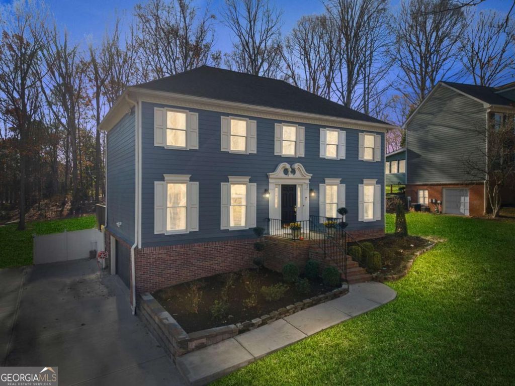 Photo of 1498 Summer Hollow Trail, Lawrenceville, GA 30043 (MLS # 10662458)