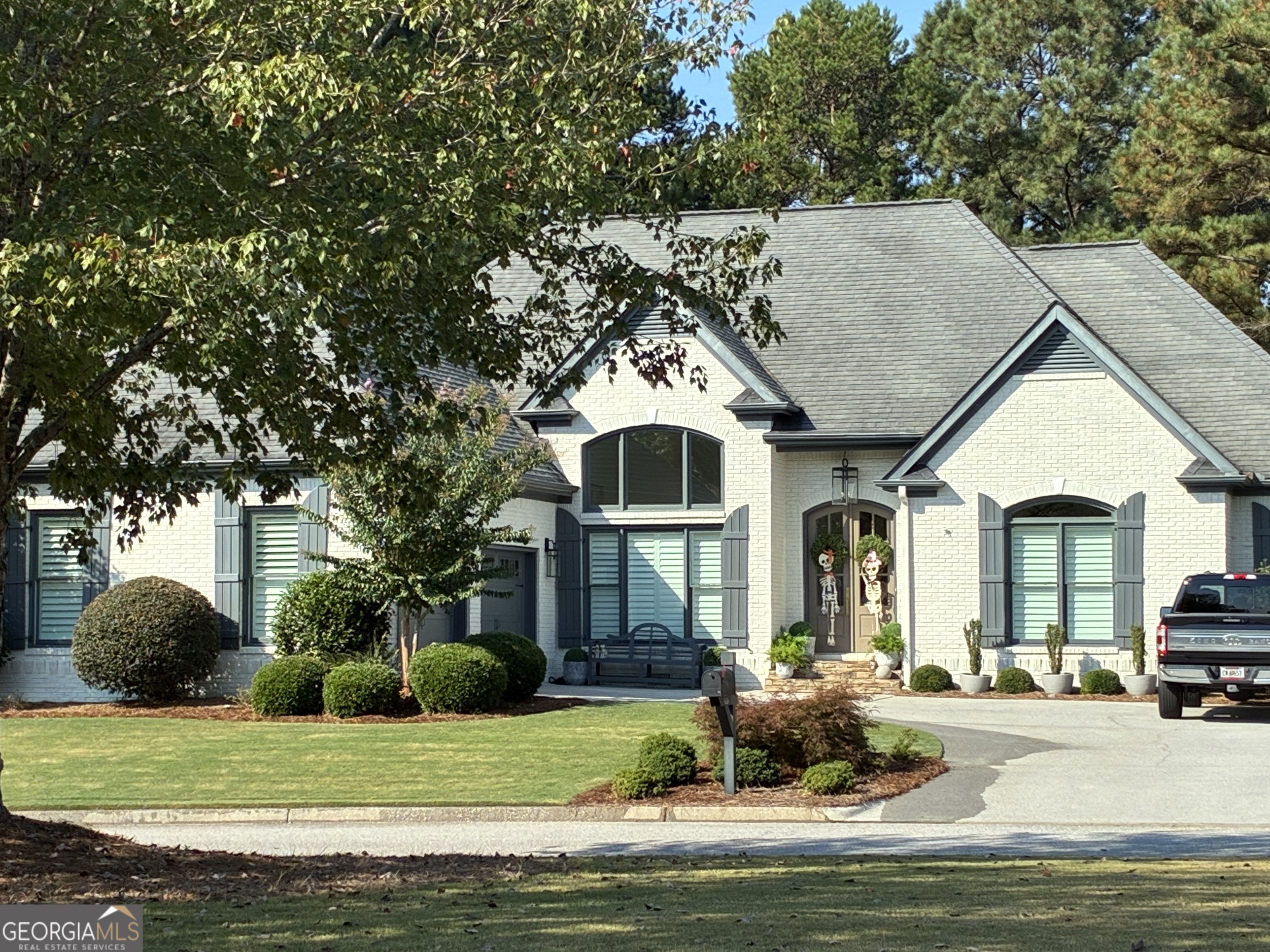 Wow! Just wow! This home should be featured in a magazine. The moment you walk into the front door you will be amazed at this, professionally decorated to perfection, home. You will love hosting family and friends for the Holidays in your formal dining room or outside on the covered pergola deck overlooking the golf course and manicure lawn. Master bedroom features a sitting room and large master bath. Imagine soaking the stress of the day away in the beautiful soaking tub or enjoy the large walk-in shower. Everything has been upgraded form the front door, wood planation blinds, flooring to the tankless water heater. To many upgrades to list here. Ride your golf cart to the Club House, Pool and Tennis, also a golf cart path to shopping and restaurants nearby. Don't miss this one!! Book your appointment today
