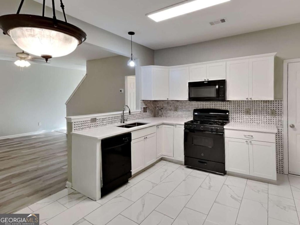 Photo of 1557 Silver Ridge Drive, Austell, GA 30106 (MLS # 10881497)