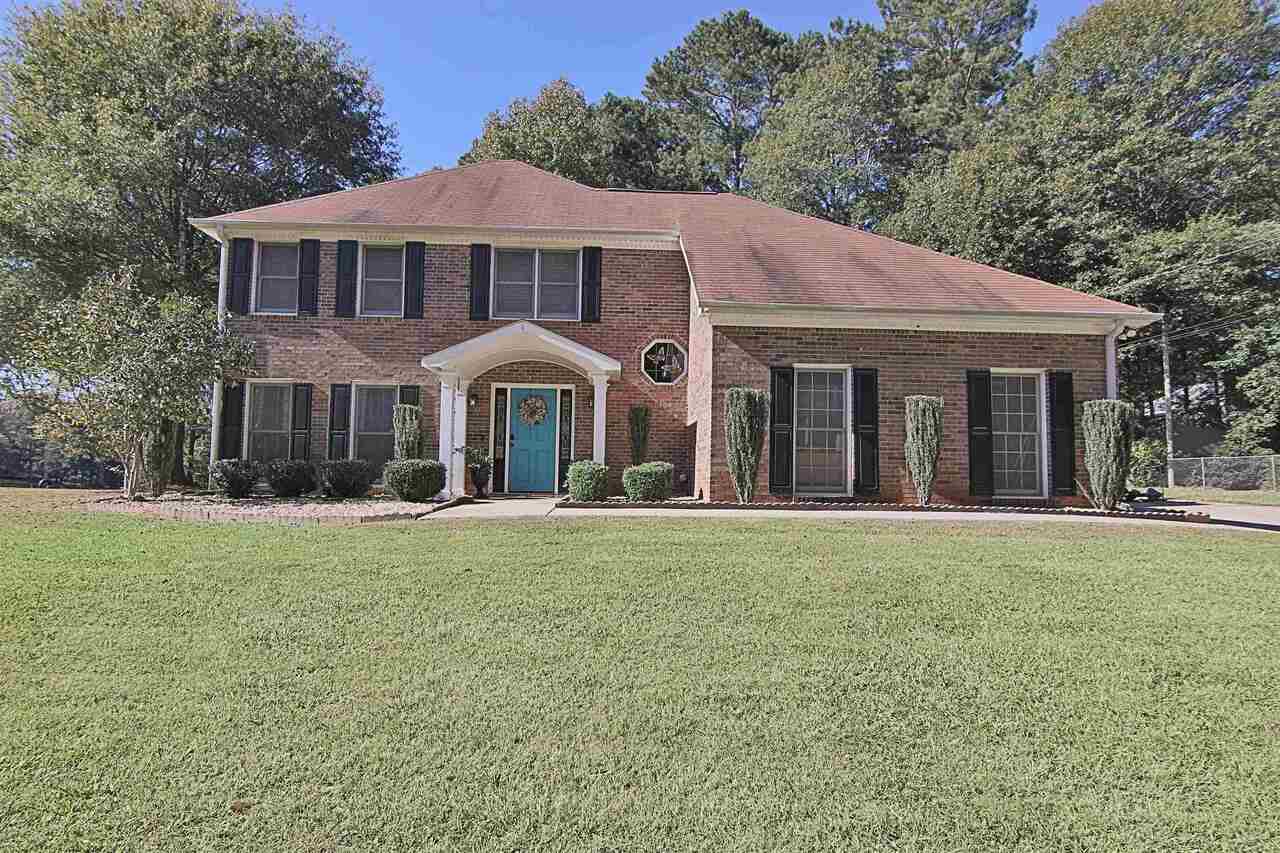 Beautifully updated three bedroom (plus a loft!) on an acre and a half! This home features all the best of on-trend, yet timeless finishes. Beautiful tile choices, paint colors, and wall finishes throughout! The main floor has a large eat-in kitchen, open to the large living area with vaulted ceilings, a great sunroom for four-season living, a large laundry room with a barn door, plus formal living and dining rooms with pretty wainscot. Upstairs are three nicely sized bedrooms plus a loft area with three closets, and amazing bathrooms! With a lake view and a convenient location close to 85, PTC, Newnan and Fayetteville, this home has it all!