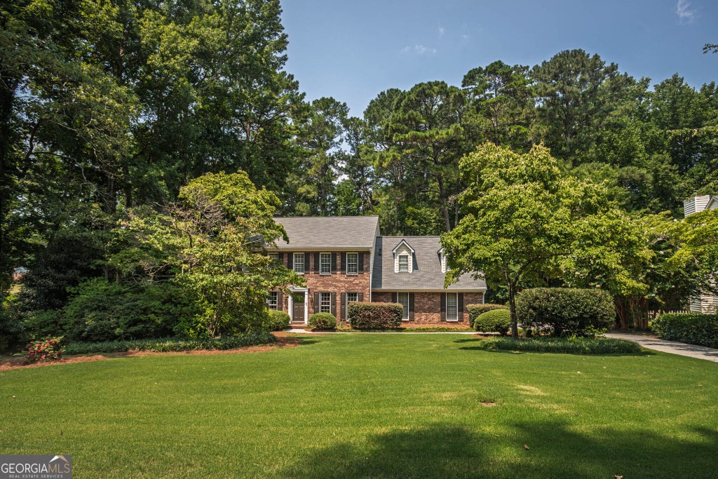Photo of 1707 Red Fox Run SW, Lilburn, GA 30047 (MLS # 10817207)