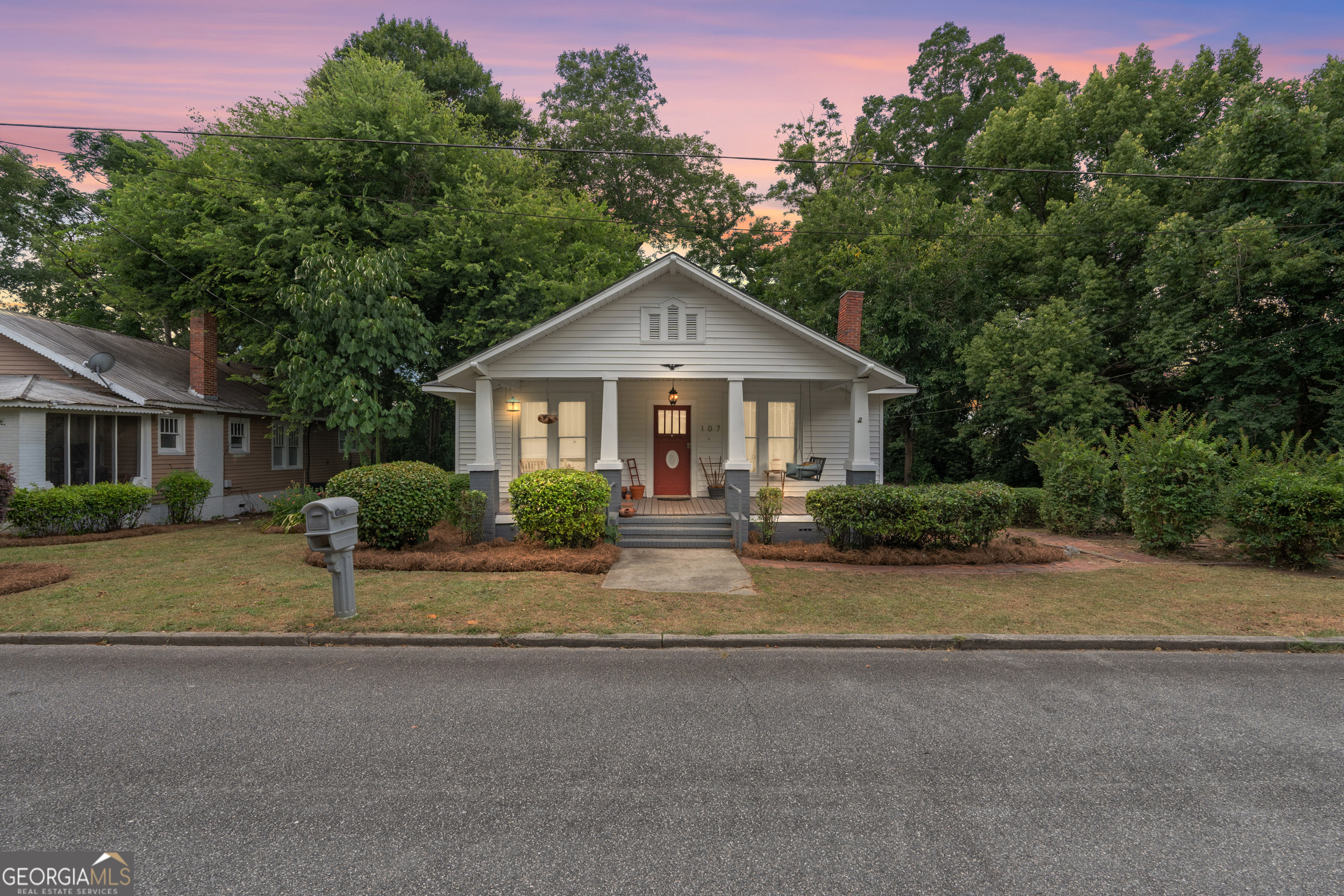Nestled within the Historic District, this charming 1940's bungalow is ready to be discovered. Upon entering, you'll find a welcoming fireplace in the living room and a cozy bedroom currently serving as an office, creating an ambiance of warmth and charm. The home features beautiful hardwood floors throughout. The farmhouse-style kitchen boasts granite countertops, combining timeless appeal with modern convenience. Located just moments away from an array of shopping and dining options, Georgia Southern University, and the upcoming Creek On The Blue Mile development, this home offers unparalleled convenience. Whether you're a first-time homebuyer, a savvy investor, or seeking the tranquility of an empty nest, this property caters to a variety of lifestyles, providing the quintessential in-town living experience. Start your mornings on the serene front covered porch, perfect for birdwatching and sipping coffee, accessible directly from the elegant living room. The generously sized lot invites you to embrace outdoor living, ideal for hosting gatherings and barbecues. Don't miss the chance to experience the allure of this charming residence firsthand. Contact me today to schedule your exclusive tour and take the first step toward making this delightful bungalow your new home. Owner is a licensed real estate agent in Georgia.