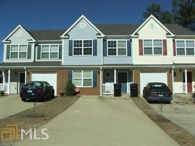 MOVE IN READY 4BED/2.5 BATH, BED ROOM ON MAIN HARDWOOD FLOORS AND NEW PAINT!! THE UPPER LEVEL FEATURES 3 SPACIOUS BEDROOMS, WASH & DRYER IN THE LAUNDRY ROOM. HOME IS LOCATED JUST MINUTES FROM SHOPPING AND RESTAURANTS. EASY ACCESS TO I-85. COMBINED LIVING AND DINING ROOM, GREAT TOWNHOUSE IN A WONDERFUL COMMUNITY.