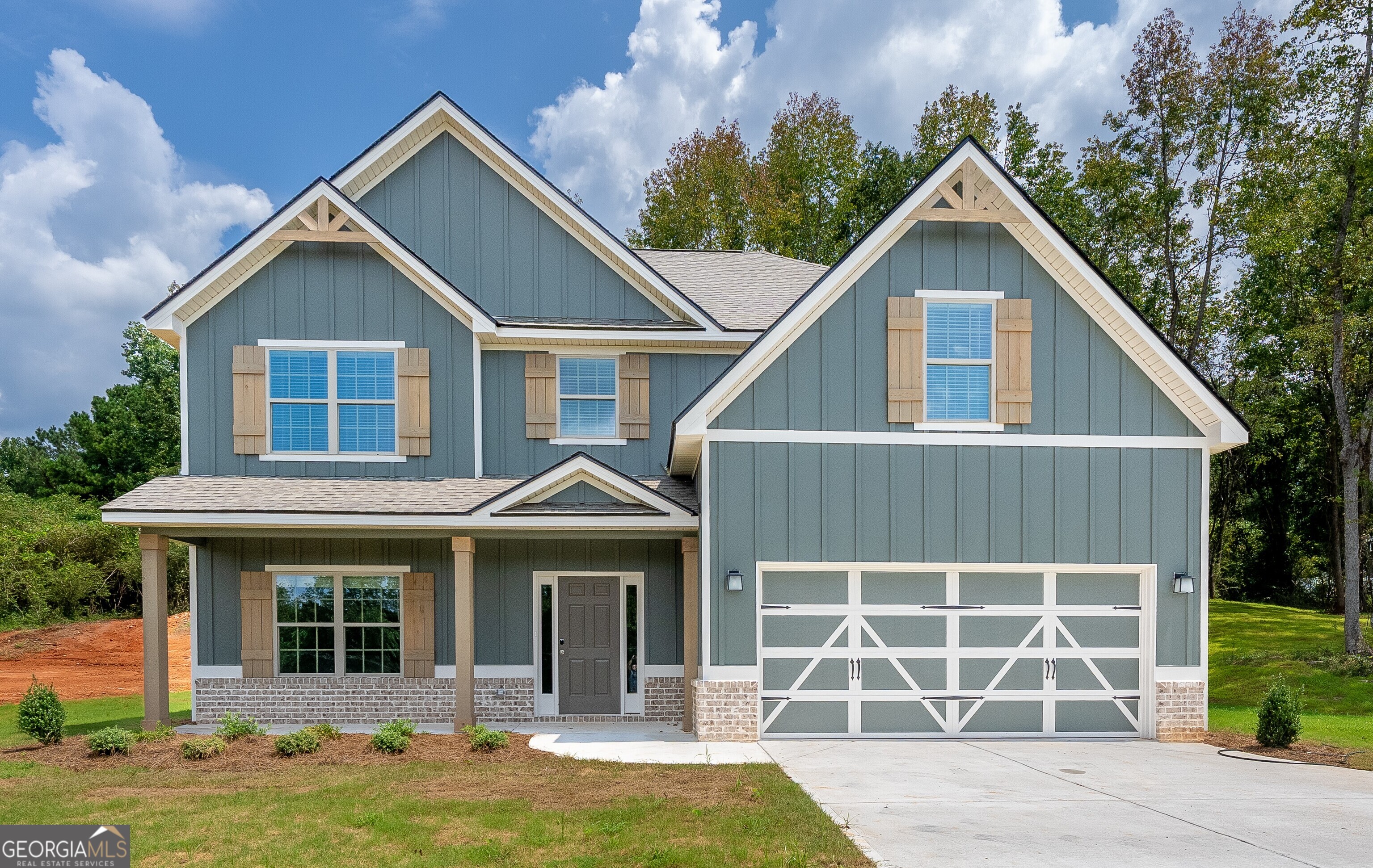 Bohannon Ridge is a new, vibrant Community located on Bohannon Road in the picturesque town of Grantville, GA. Welcome to our Cannaberra A Floorplan. Stylish & Sensible with 2787 SF of Inviting Living Space. Formal Dining Room, Spacious Great Room, Open Kitchen, 5 Bedroom, 3 Baths, 2 Car Garage & Our Signature Gameday Patio w/ Wood Burning Fireplace is the Perfect Space to Spend a Crisp Fall Evening! Elevate your lifestyle with Home Automation, Keyless Entry, Video Doorbell, Automated Front Porch Light, and more! Natural Light galore in the Entry Foyer, Formal Dining with Tons of Detail, Spacious Great Room features Wood Burning Fireplace, Open Kitchen with Tons of Stylish Cabinetry, Granite Countertops, Tiled Backsplash, & Stainless Appliances. Huge Kitchen Island & Walk-in Pantry for additional Storage. Owner's Entry Boasts Signature Drop Zone, Ideal Catch All. 5th Bedroom & Full Bath Conveniently located on Main Level. Upstairs, you will find the Generously Sized Owner's Suite offers a great place to unwind. Owner's Bath with Garden Tub, Separate Shower & Huge Walk-in Closet. Additional Bedrooms offer tons of Closet Space. Laundry & Hall Bath just steps away from Bedrooms. Durable Vinyl Plank Flooring Throughout Living Spaces on Main Level & Tons of Hughston Homes Included Features. Our Signature Gameday Patio w/ Wood Burning Fireplace is the Perfect Space to Spend a Crisp Fall Evening!